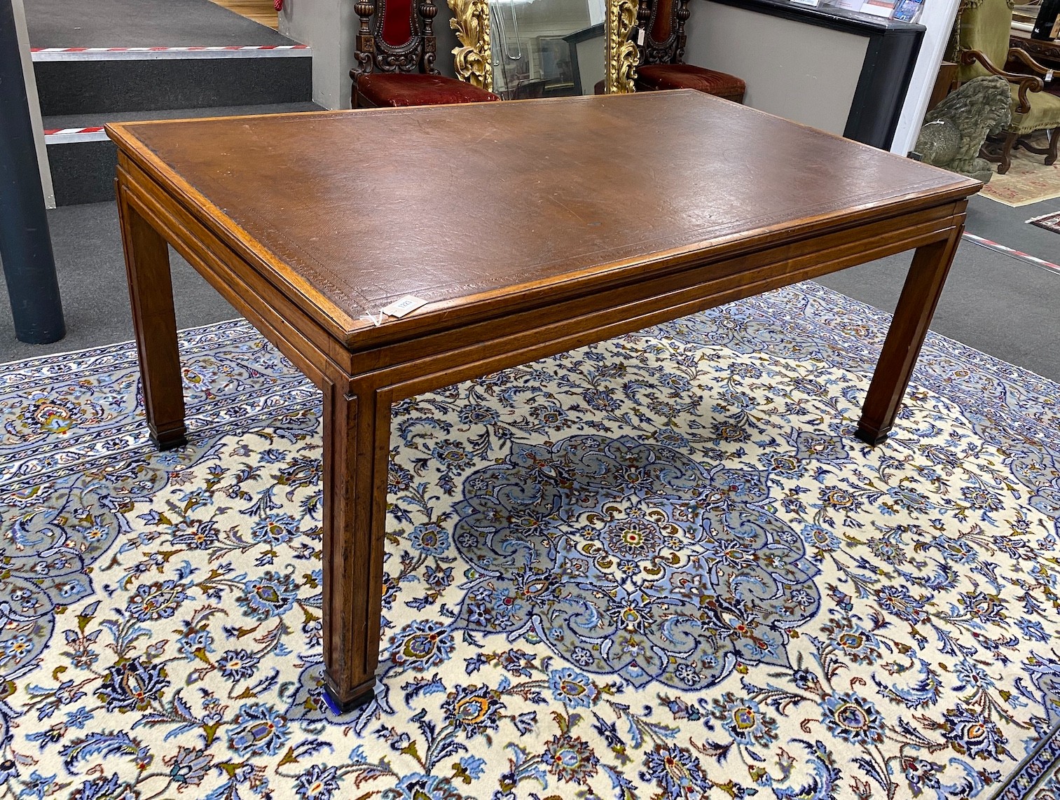 SOLD An Art Deco rectangular mahogany library table with leather inset top, bears Howard & Son retail plaque, length 175cm, width 99cm, height 77cm                                                                         