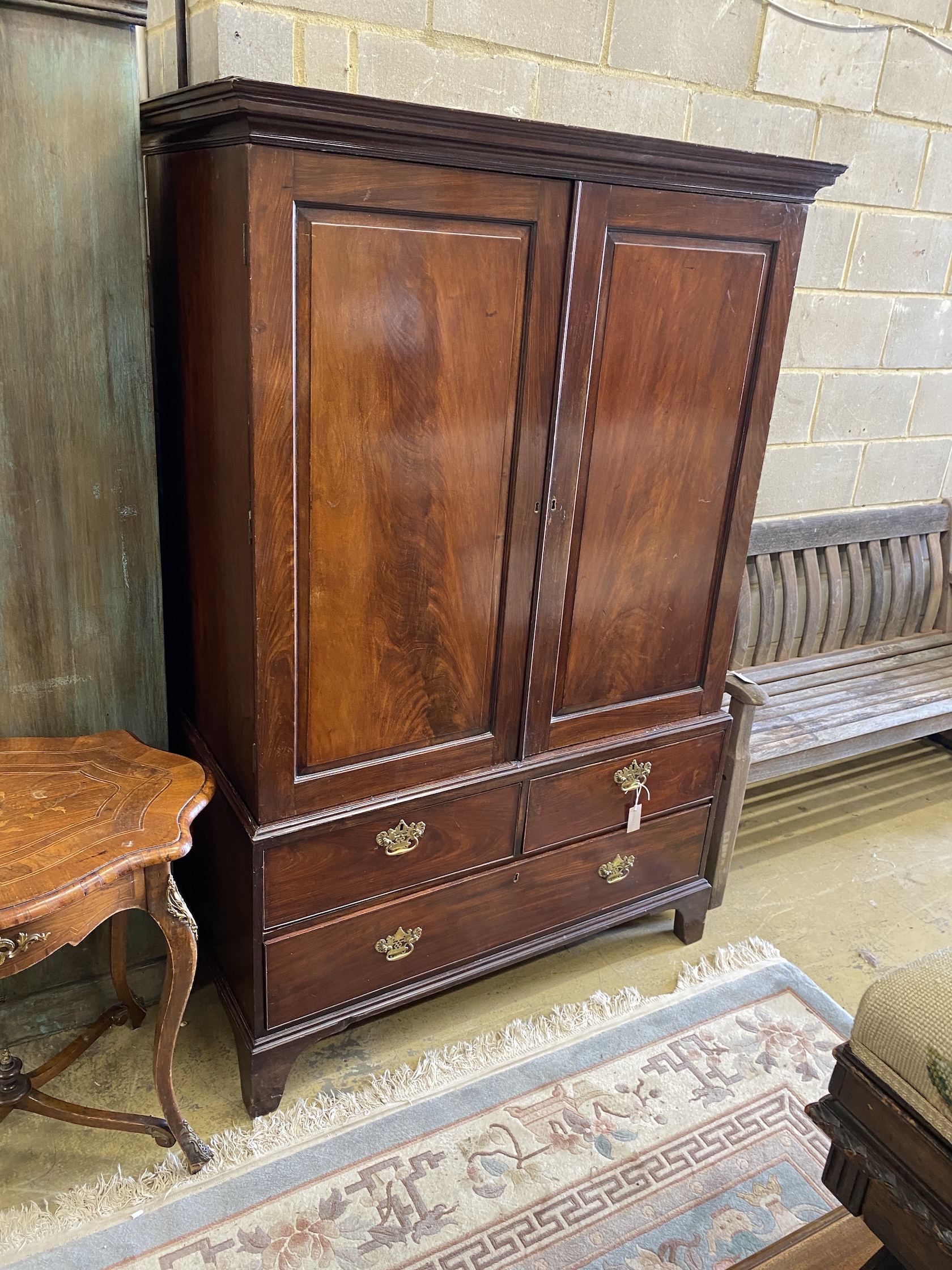 A George III mahogany linen press, width 122cm, depth 62cm, height 185cm                                                                                                                                                    