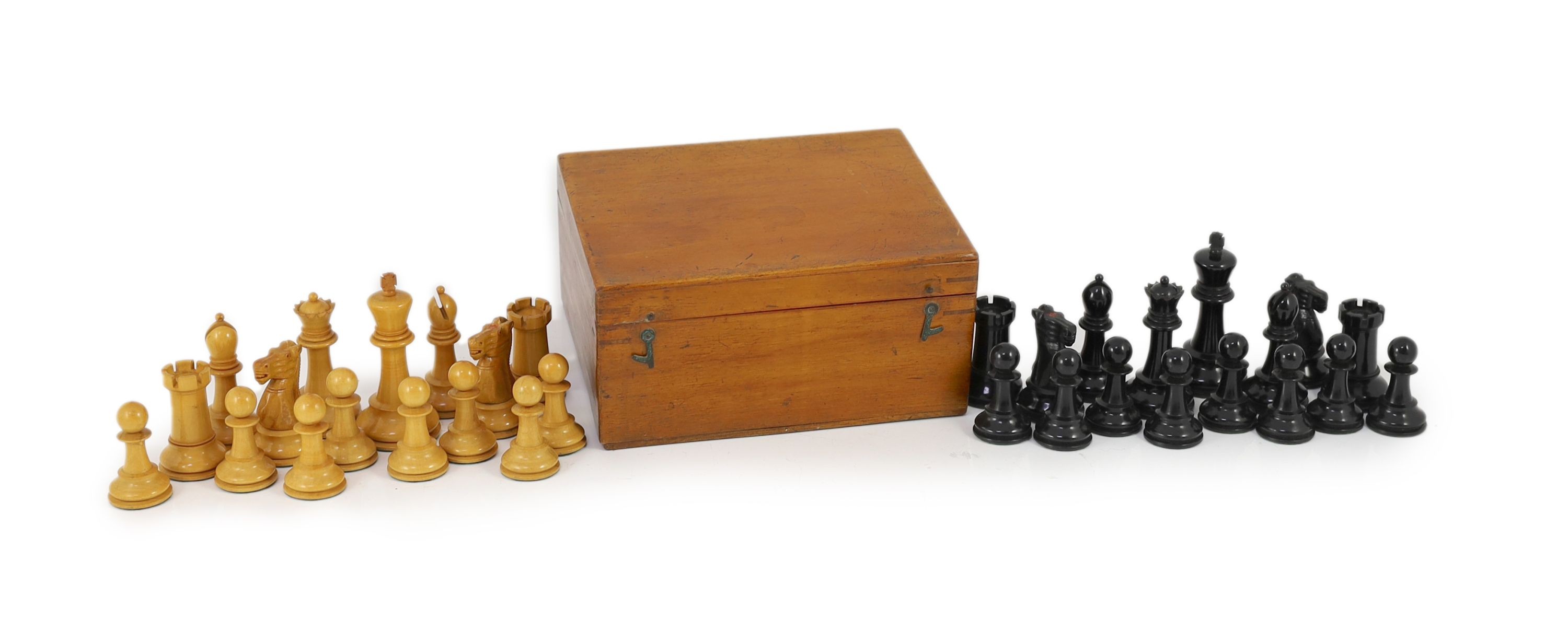 A Jaques & Son Ltd, London 4 in. club size Staunton boxwood and ebony chess set.                                                                                                                                            