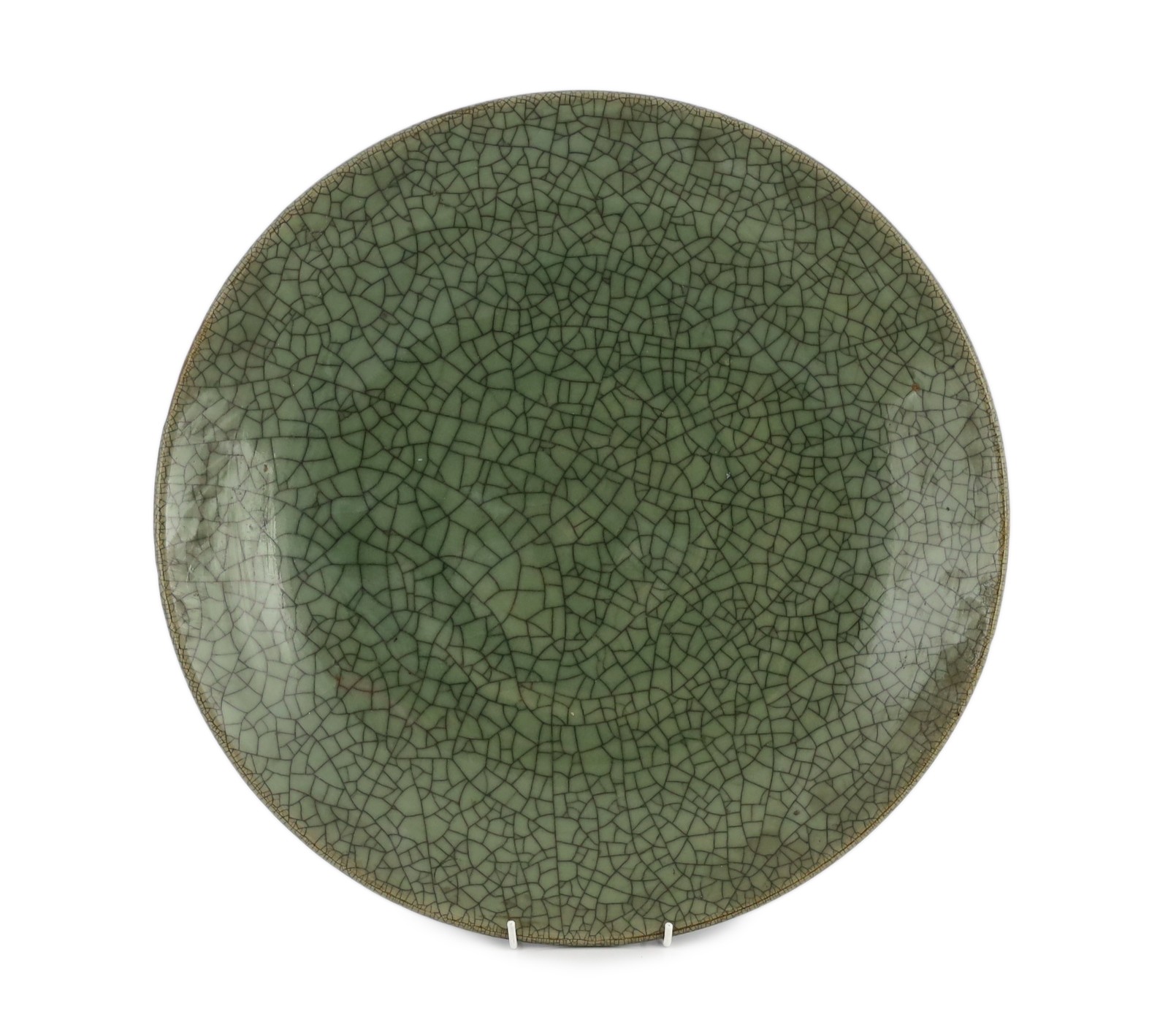 A large Chinese Guan type crackle glaze dish, 19th/20th century, 45.5cm diameter                                                                                                                                            