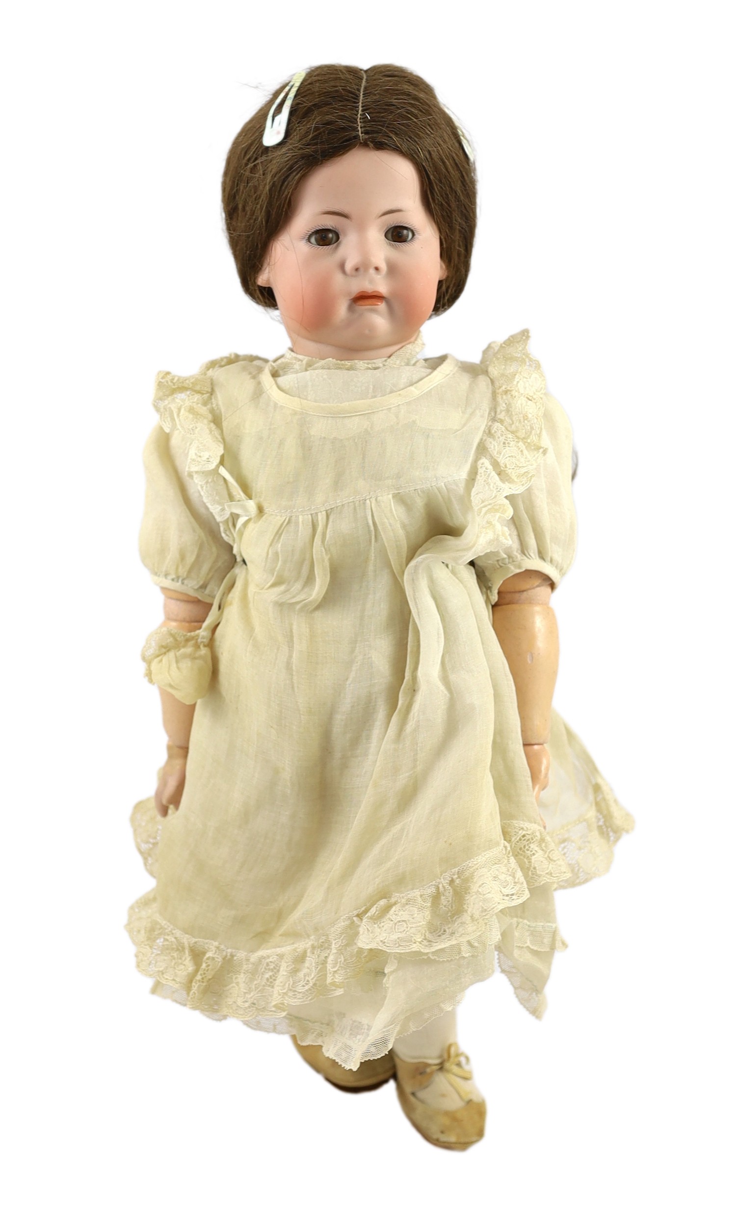 A Kammer & Reinhardt / Simon & Halbig bisque character doll, German, circa 1911, 19in.                                                                                                                                      