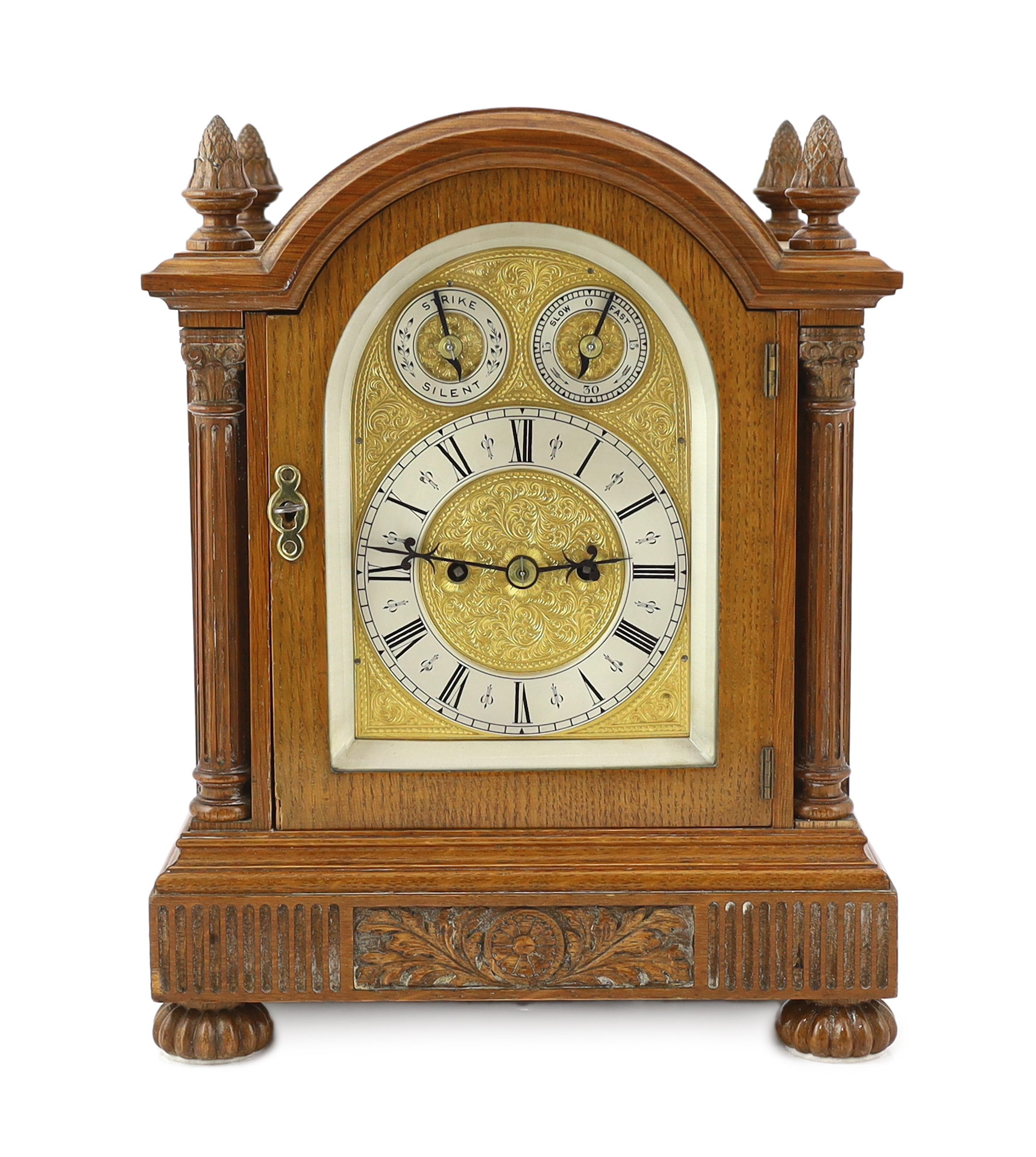 An Edwardian golden oak eight day bracket clock 28cm wide, 19cm deep, 36cm high                                                                                                                                             