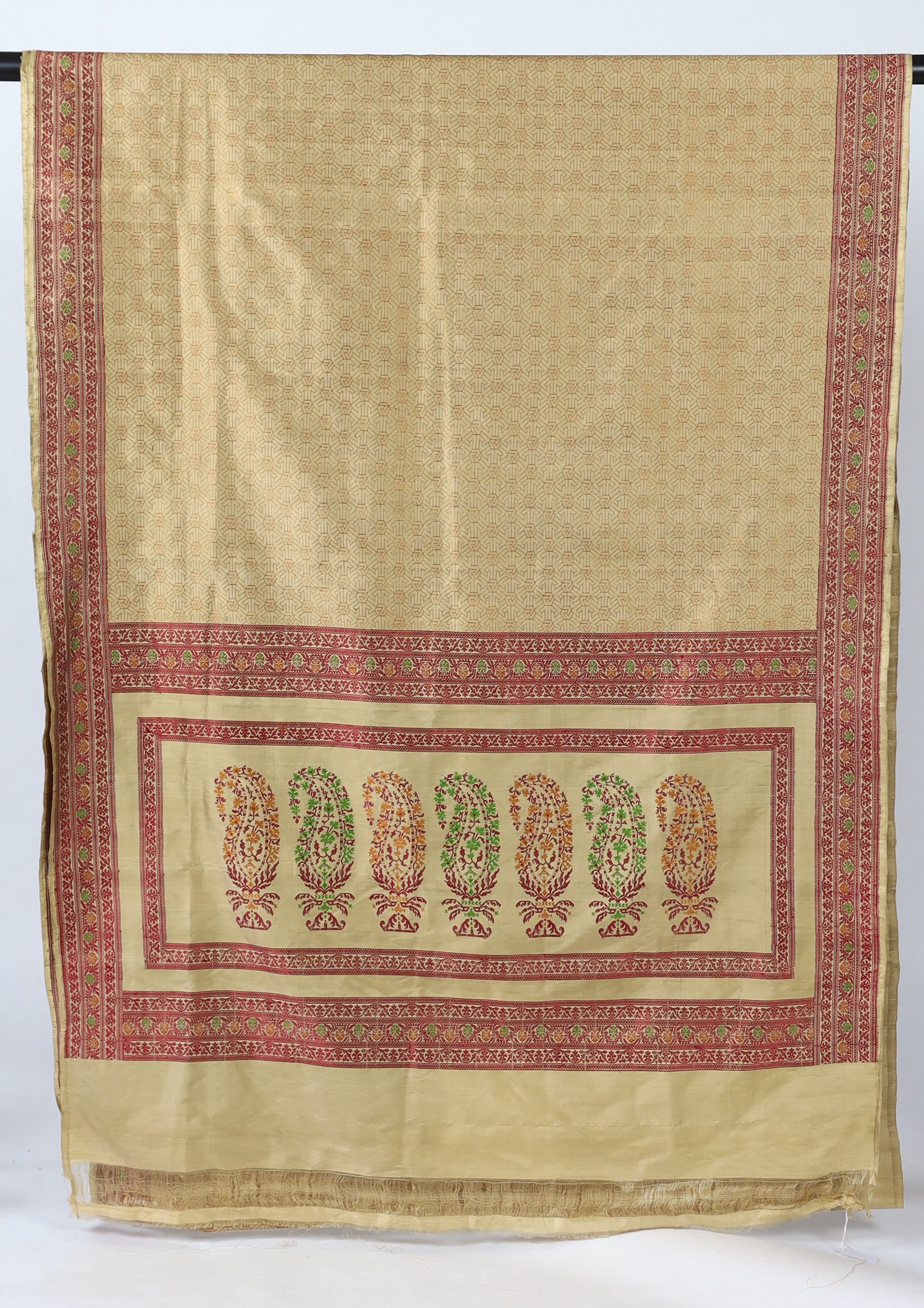 An Indian Varansi, 1980’s, hand woven silk sari by Mohammad Jafar Ali, woven in traditional style as a wedding sari, unused, 620cm long, 115cm wide, comes with provenance                                                  