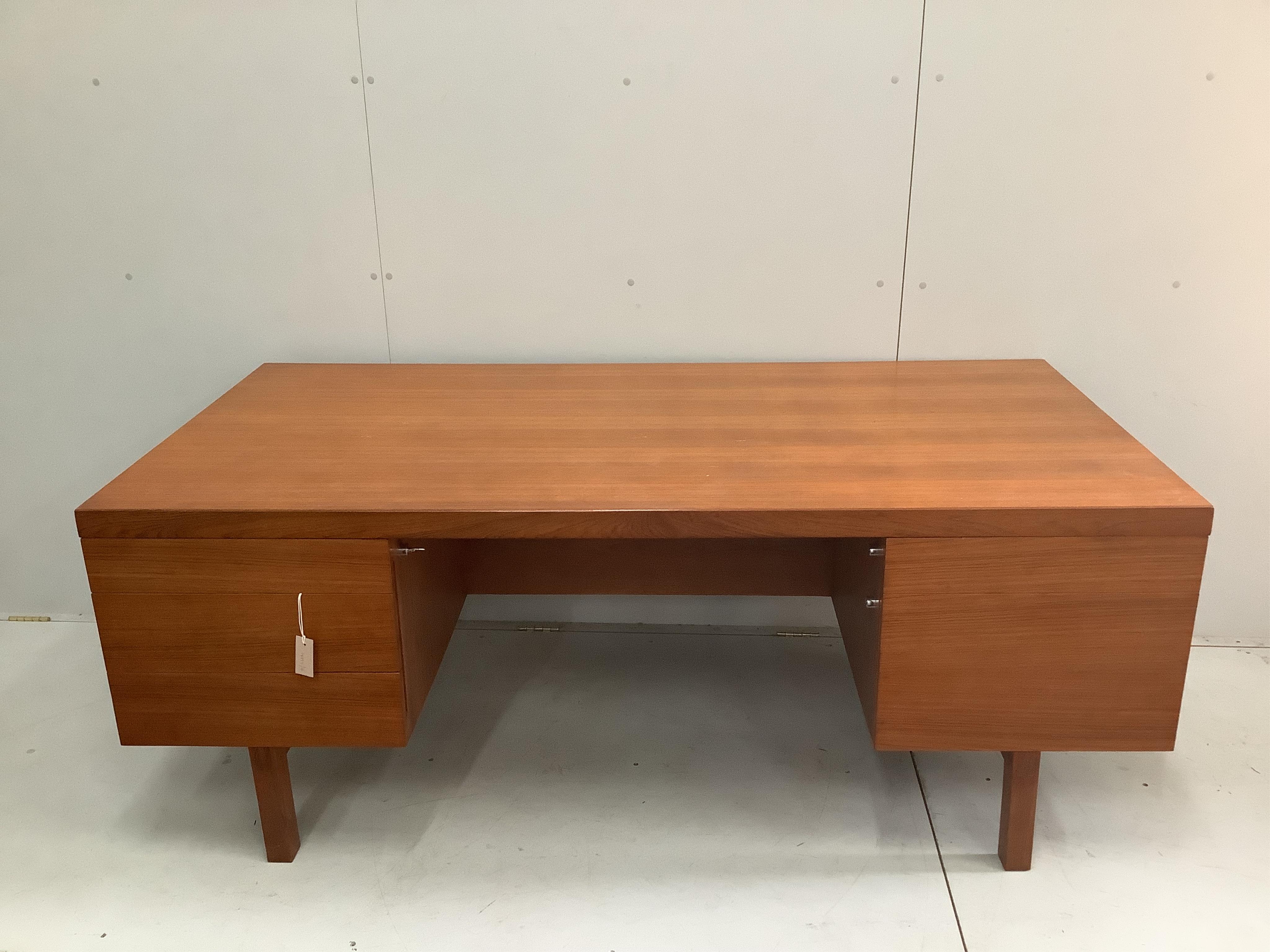 Alfred Cox, a mid century teak kneehole desk, width 92cm, height 71cm. Condition - good                                                                                                                                     