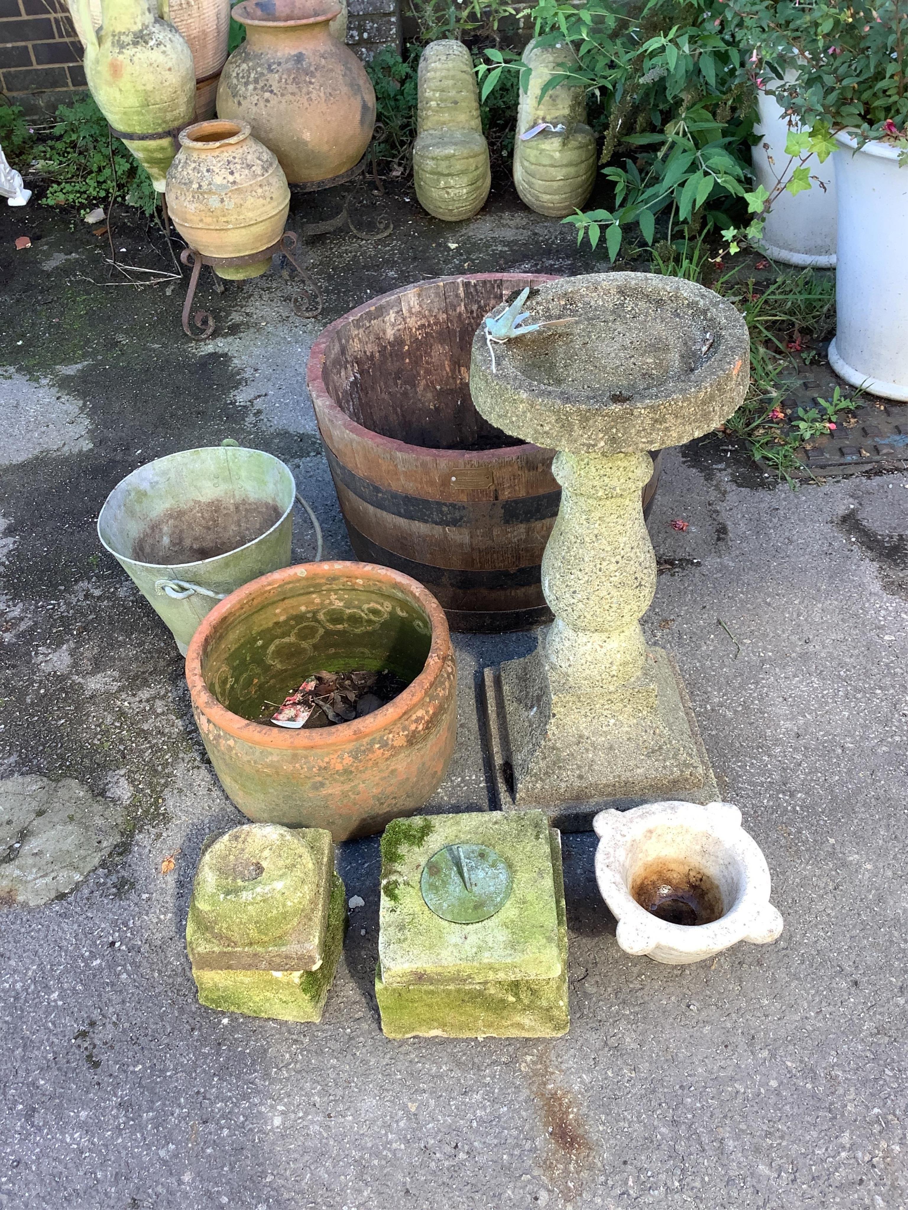 A reconstituted stone bird bath, an oak half barrel tub, a marble mortar, a sun dial, height 67cm, a terracotta pot and a galvanised bucket. Condition - all weathered, sun dial with notable damage                        