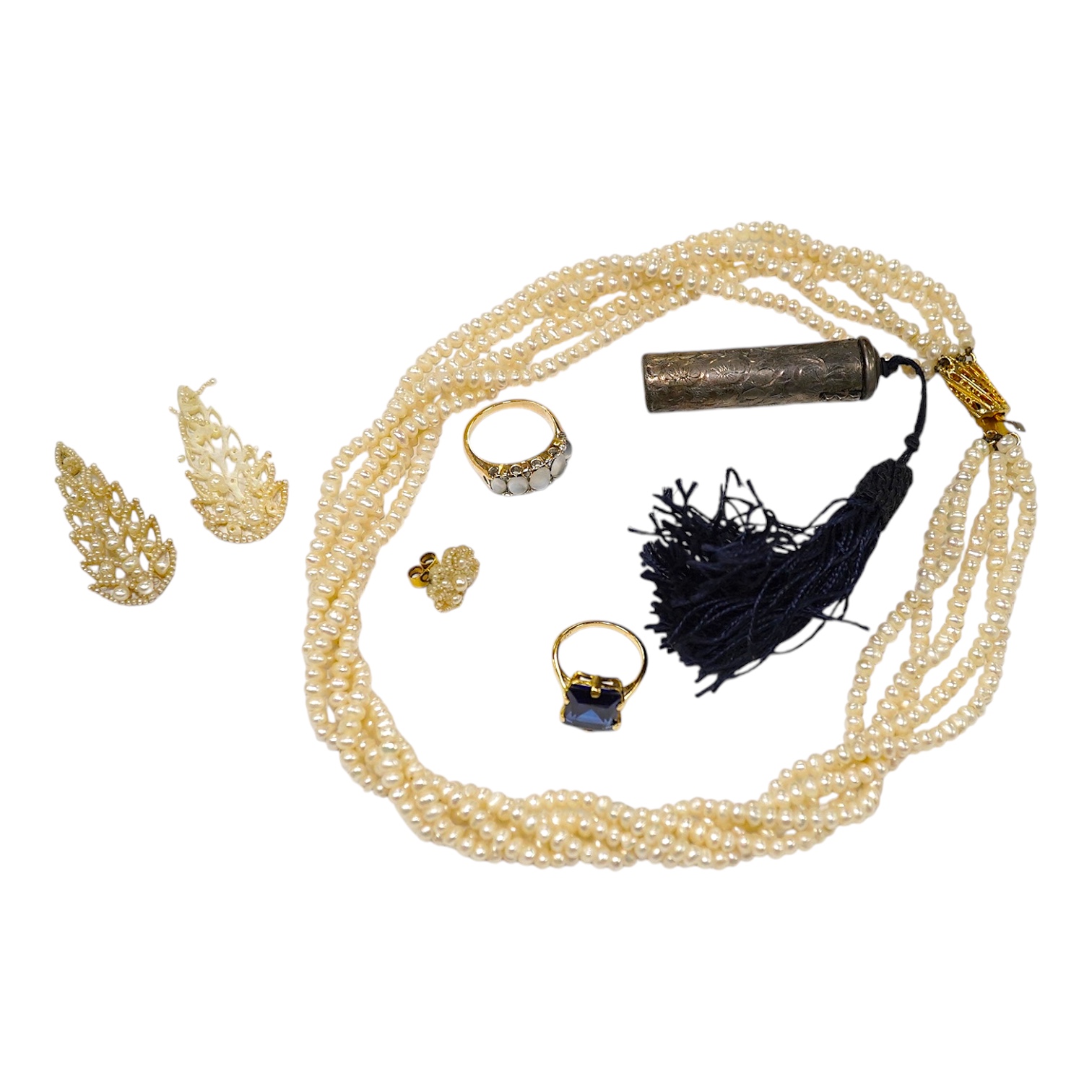 A collection of jewellery including a pearl necklace, an 18ct and gem set dress ring and a yellow metal and graduated five stone moonstone set half hoop ring, with diamond chip spacers, size L, gross weight 4.8 grams. Co