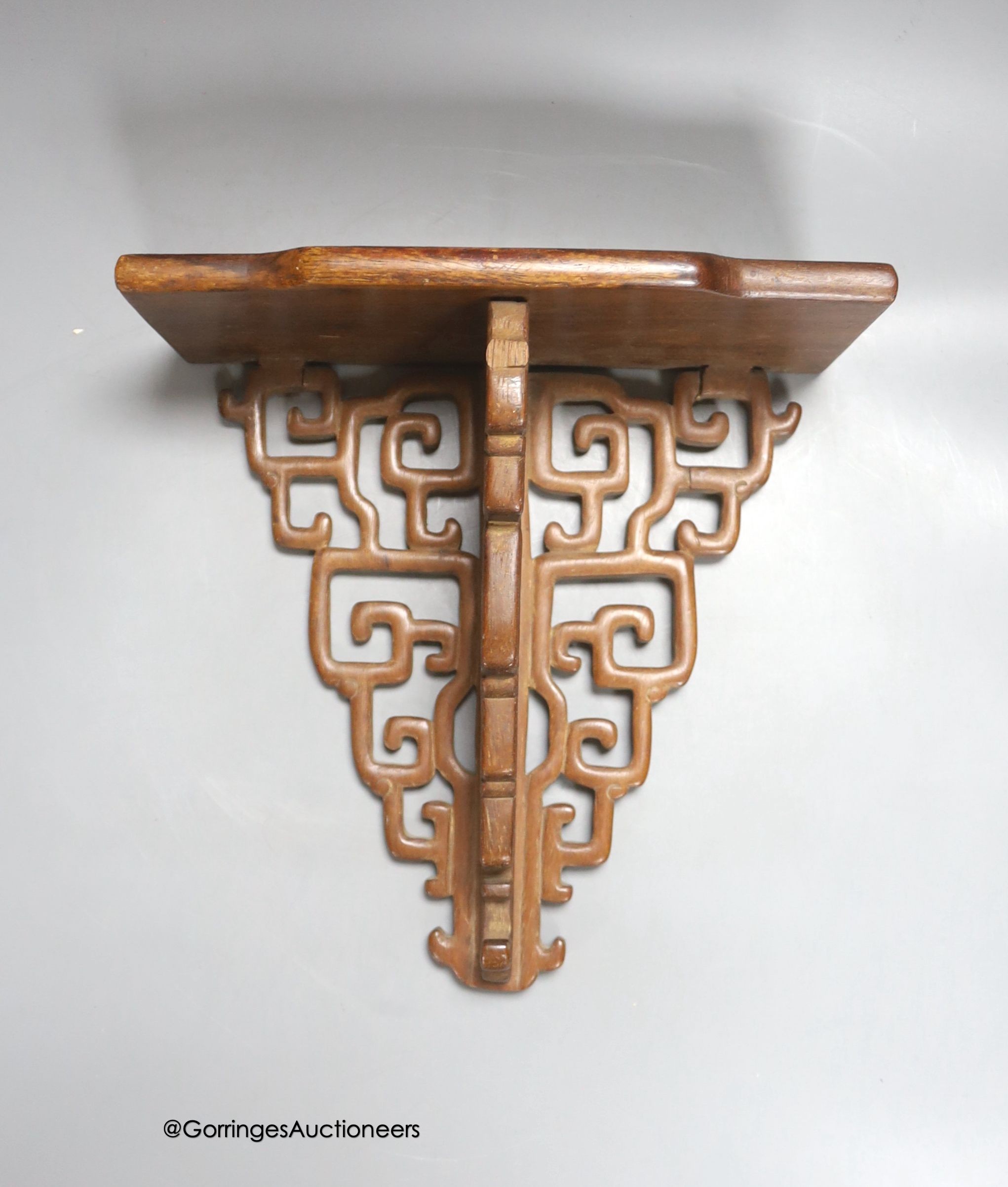 A Chinese hardwood wall bracket, late Qing, length 23cm                                                                                                                                                                     