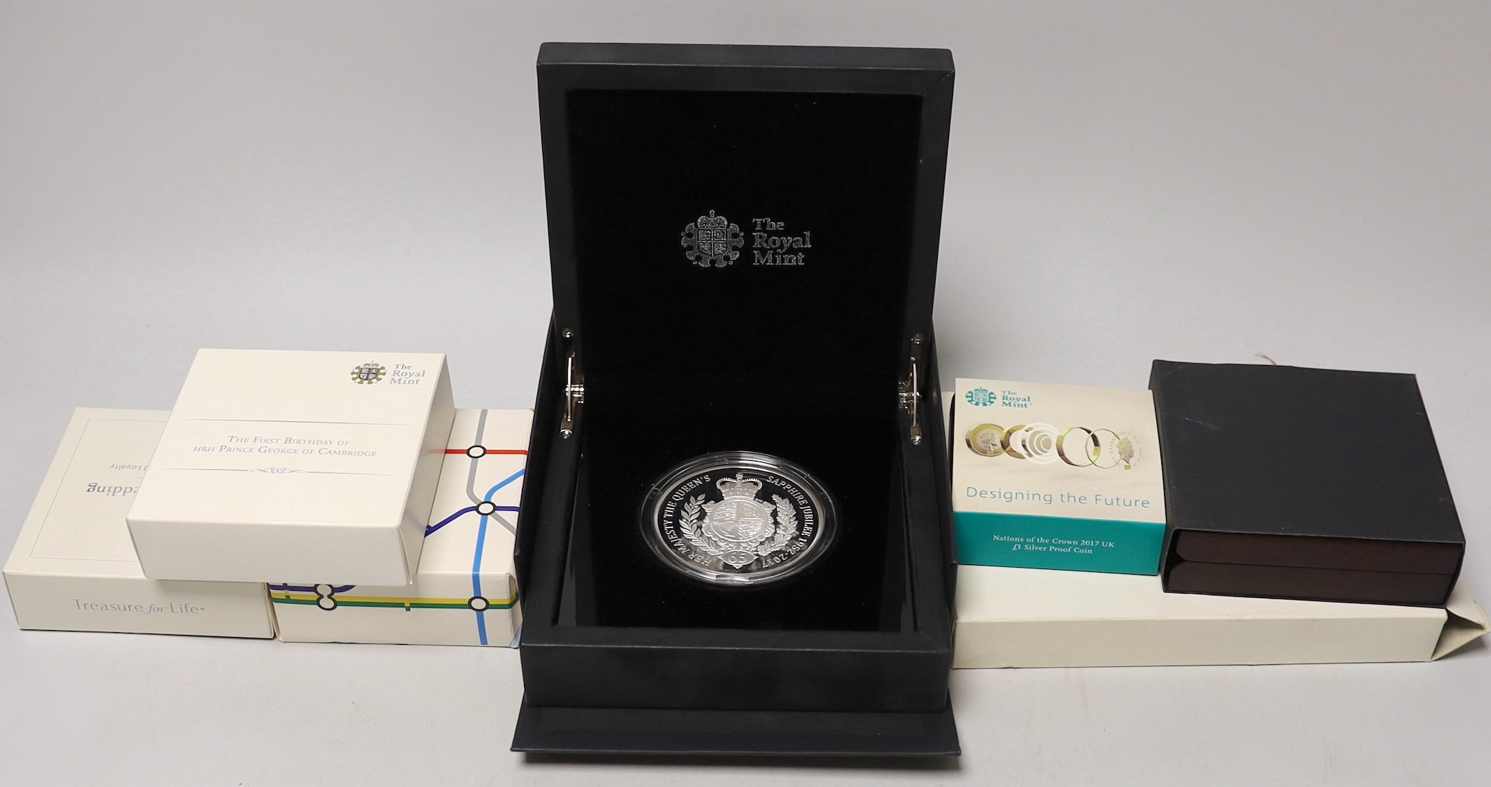 A group of Royal Mint boxed proof collector's coins                                                                                                                                                                         