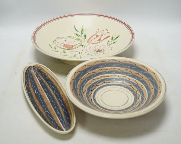 Three various Poole pottery dishes, largest 32cm. Condition - good                                                                                                                                                          