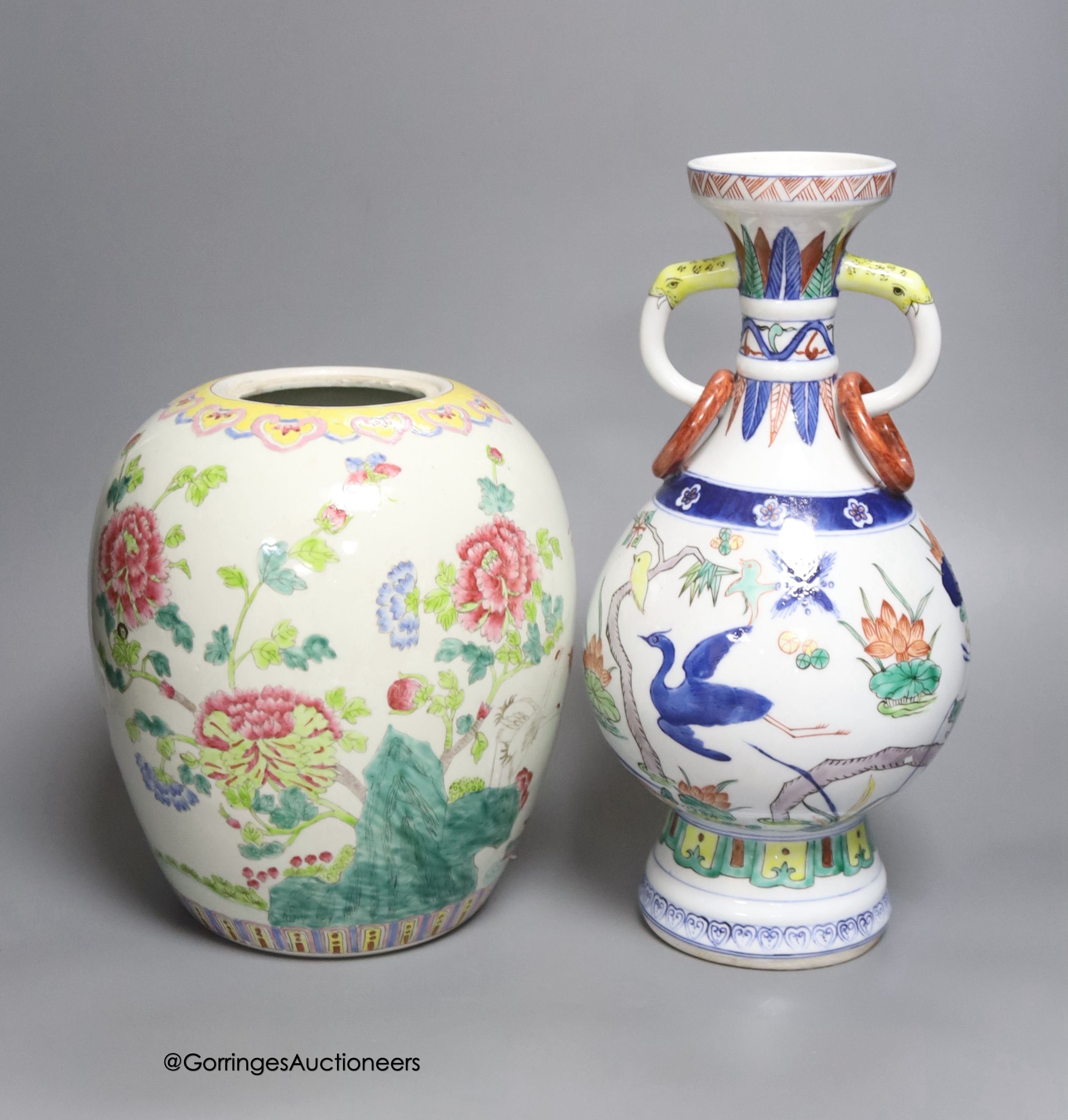 A Chinese famille rose jar and a polychrome vase, tallest 31cm                                                                                                                                                              