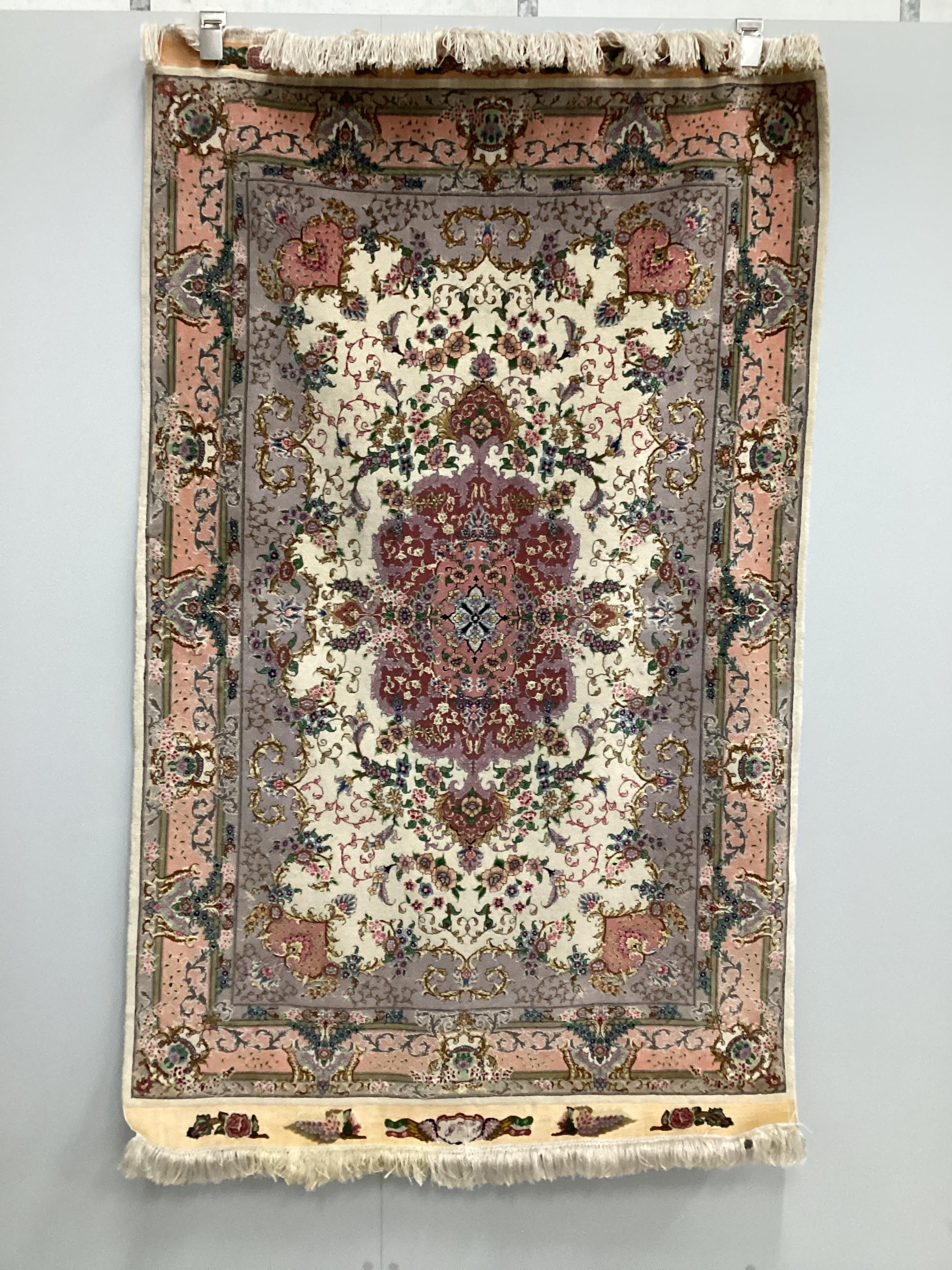 A North West Persian ivory ground part silk rug, 160 x 100cm                                                                                                                                                                