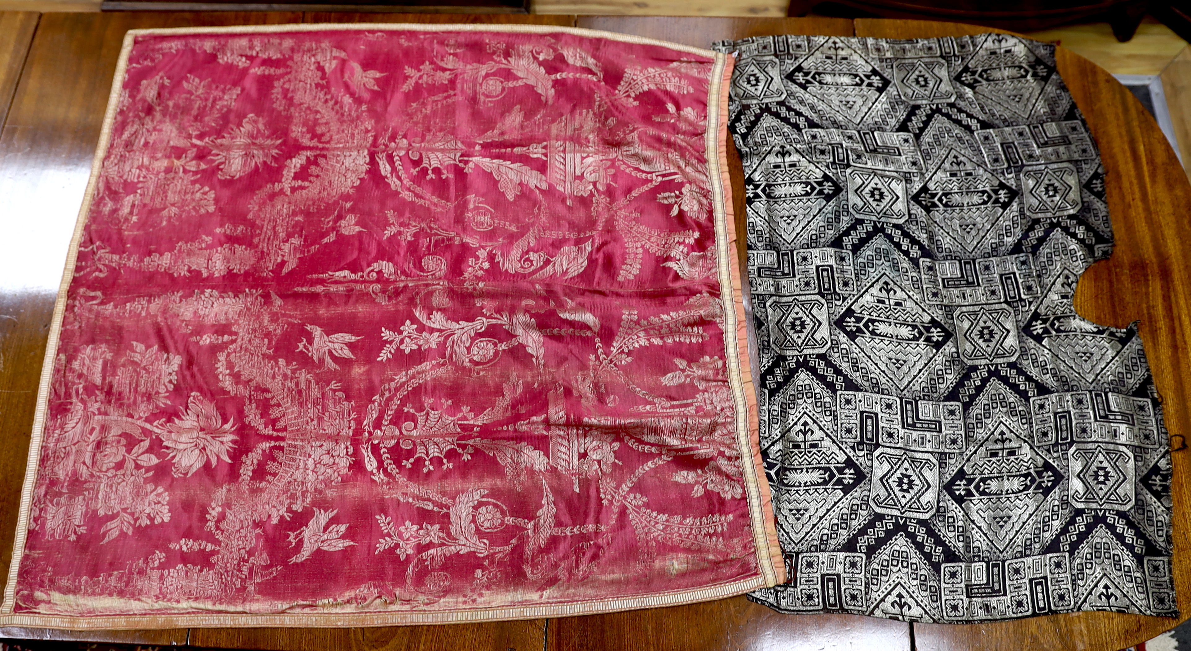 Three panels of 19th century silk, two silk brocade, one silk damask together with a panel of 1930’s silver woven geometric designed lame.                                                                                  