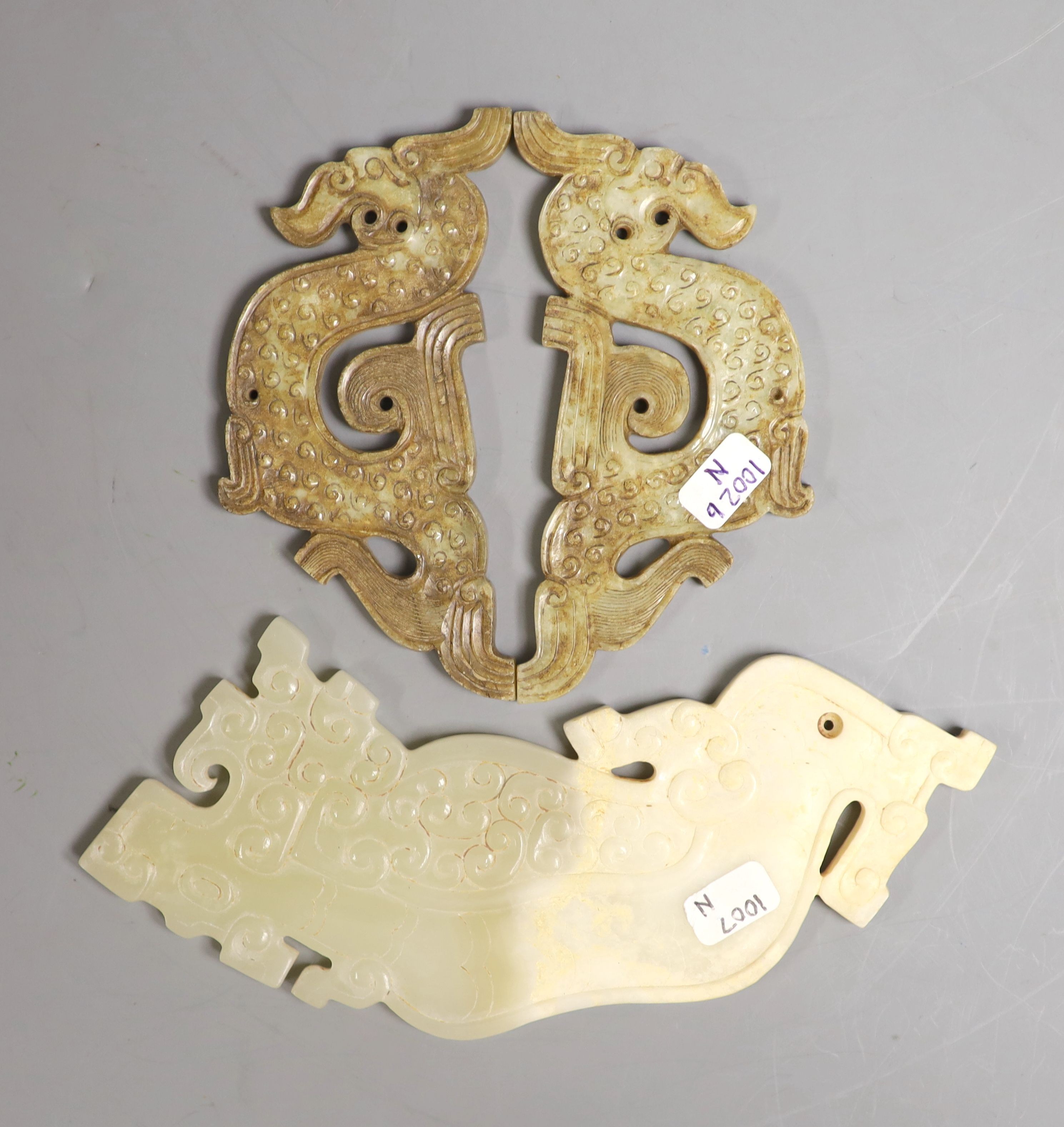 A pair of Chinese archaistic jade plaques and a similar calcified jade plaque                                                                                                                                               