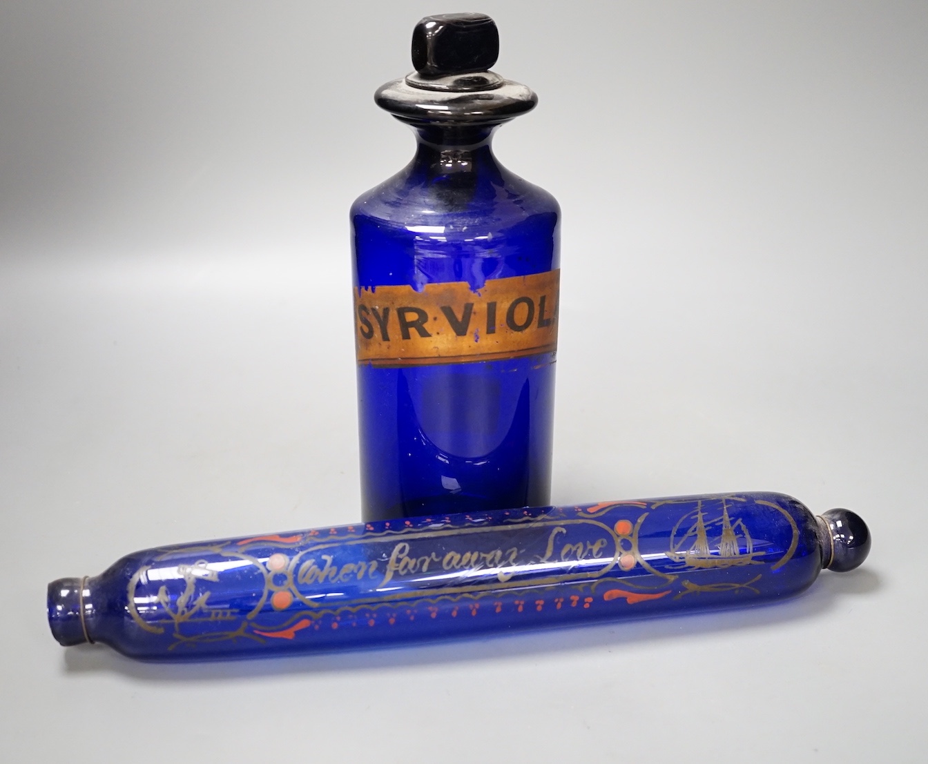 A Victorian cobalt blue glass apothecary jar and a rolling pin (2)                                                                                                                                                          