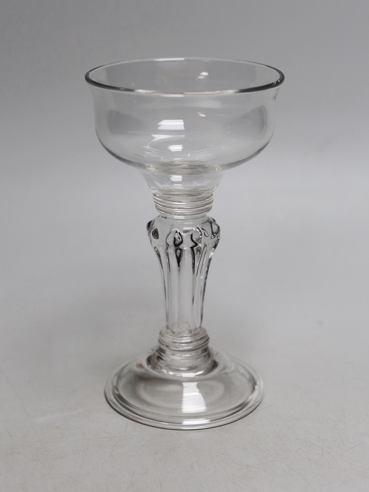 A George II pedestal stem sweetmeat glass, 16cms high                                                                                                                                                                       