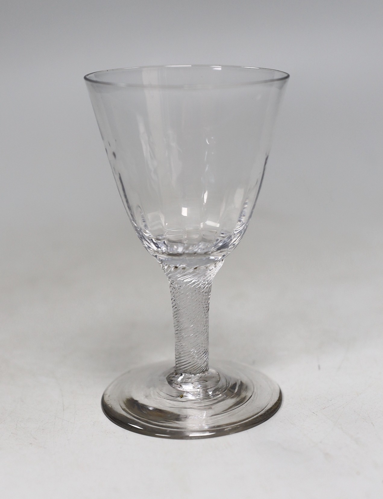 A George III incised stem drinking glass, 12.5cms high                                                                                                                                                                      
