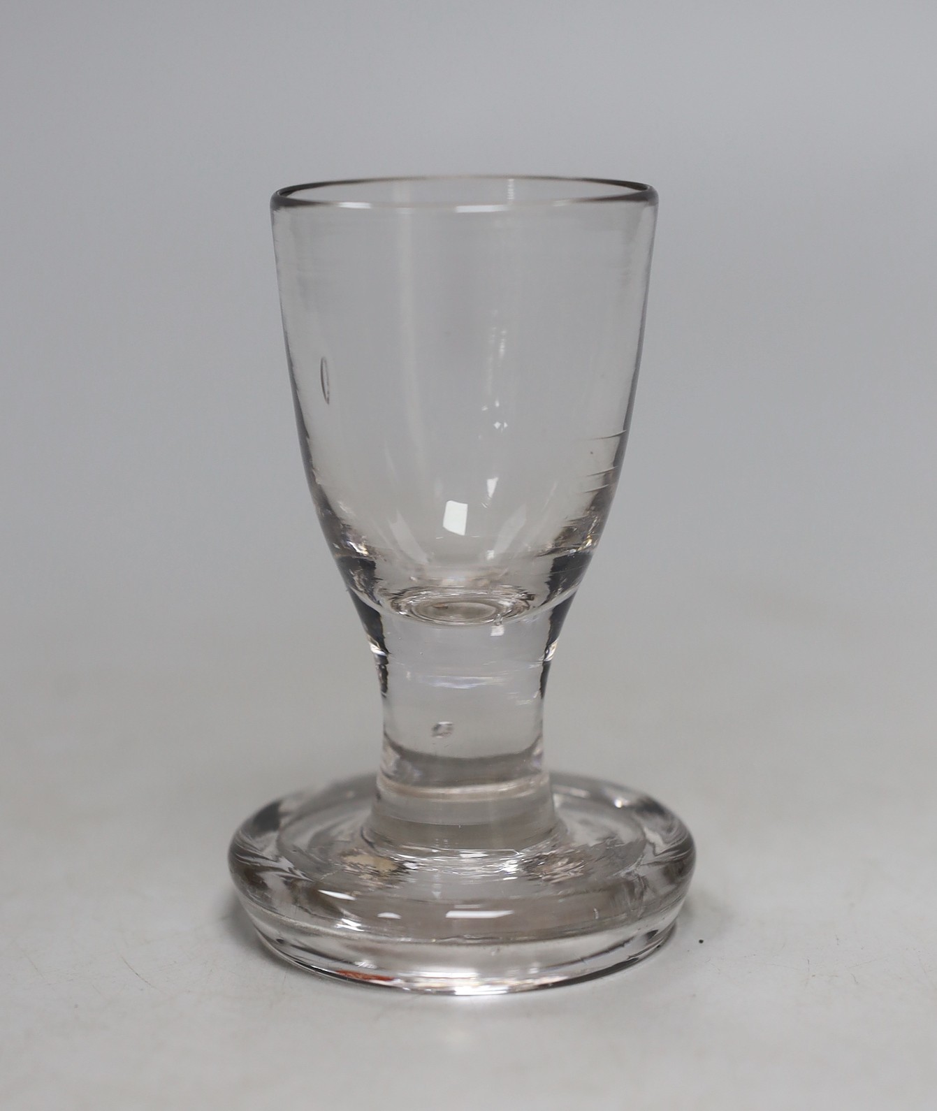 A George III toasting glass, 9.5cms high                                                                                                                                                                                    