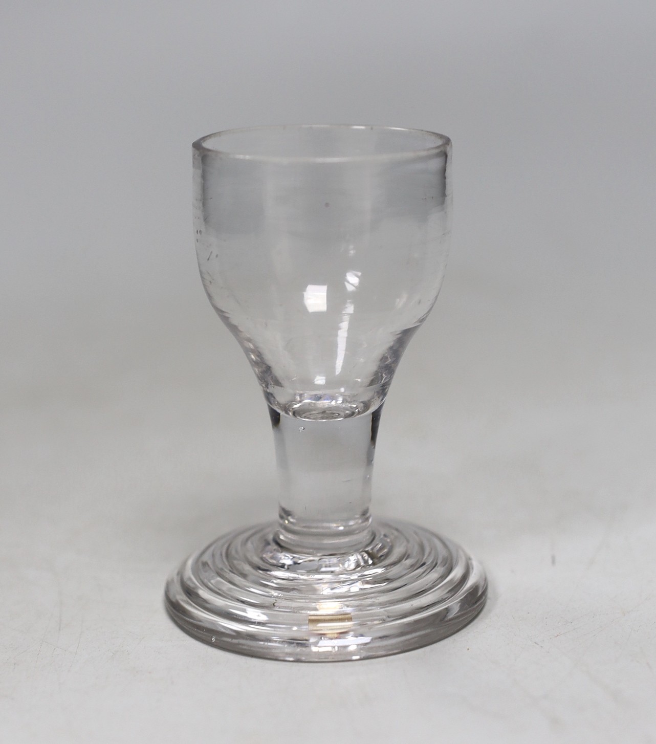 A George III stepped foot toasting glass, 9.5cms high                                                                                                                                                                       