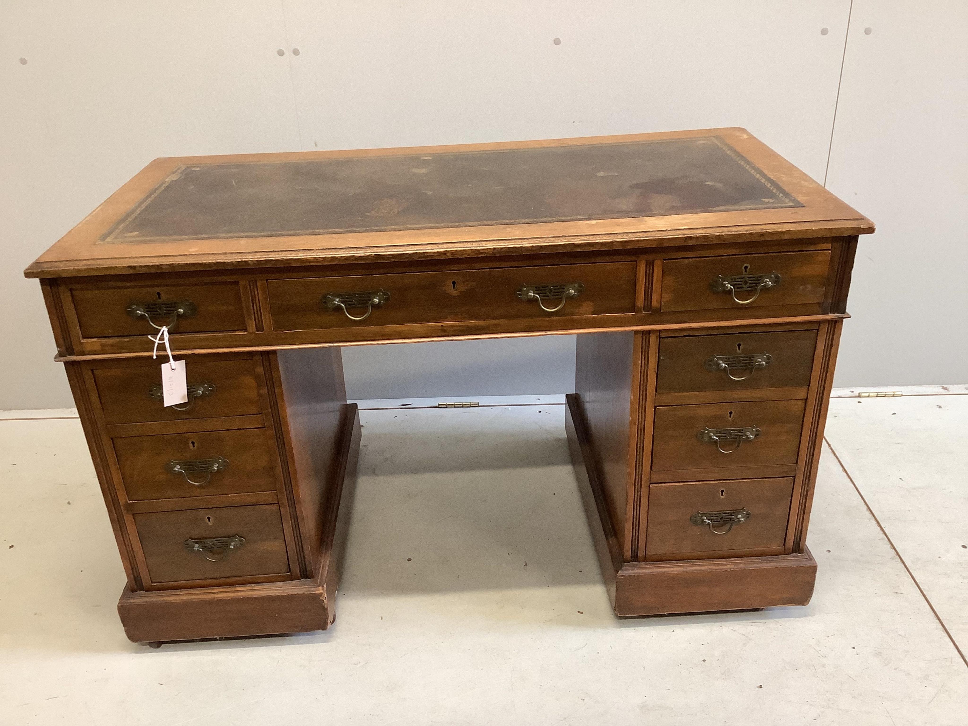 A late Victorian oak pedestal desk, width 120cm, depth 64cm, height 73cm. Condition - poor to fair                                                                                                                          