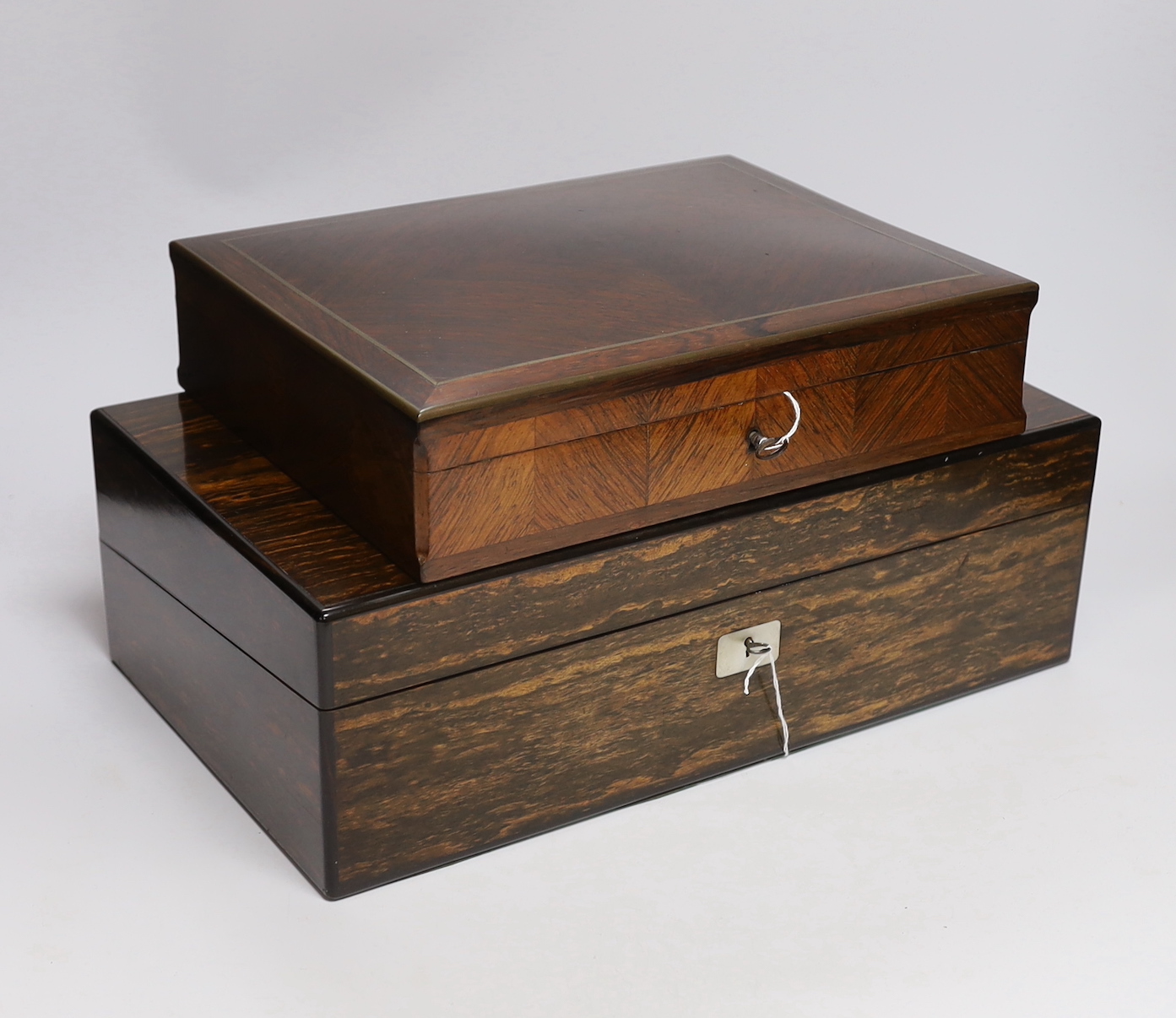 A Victorian calamander writing slope, 40.5cm wide, 24cm deep, 13cm high, together with a French rosewood box, 31cm wide, 24cm deep, 7cm high Submission reference 7FFVMS95                                                  