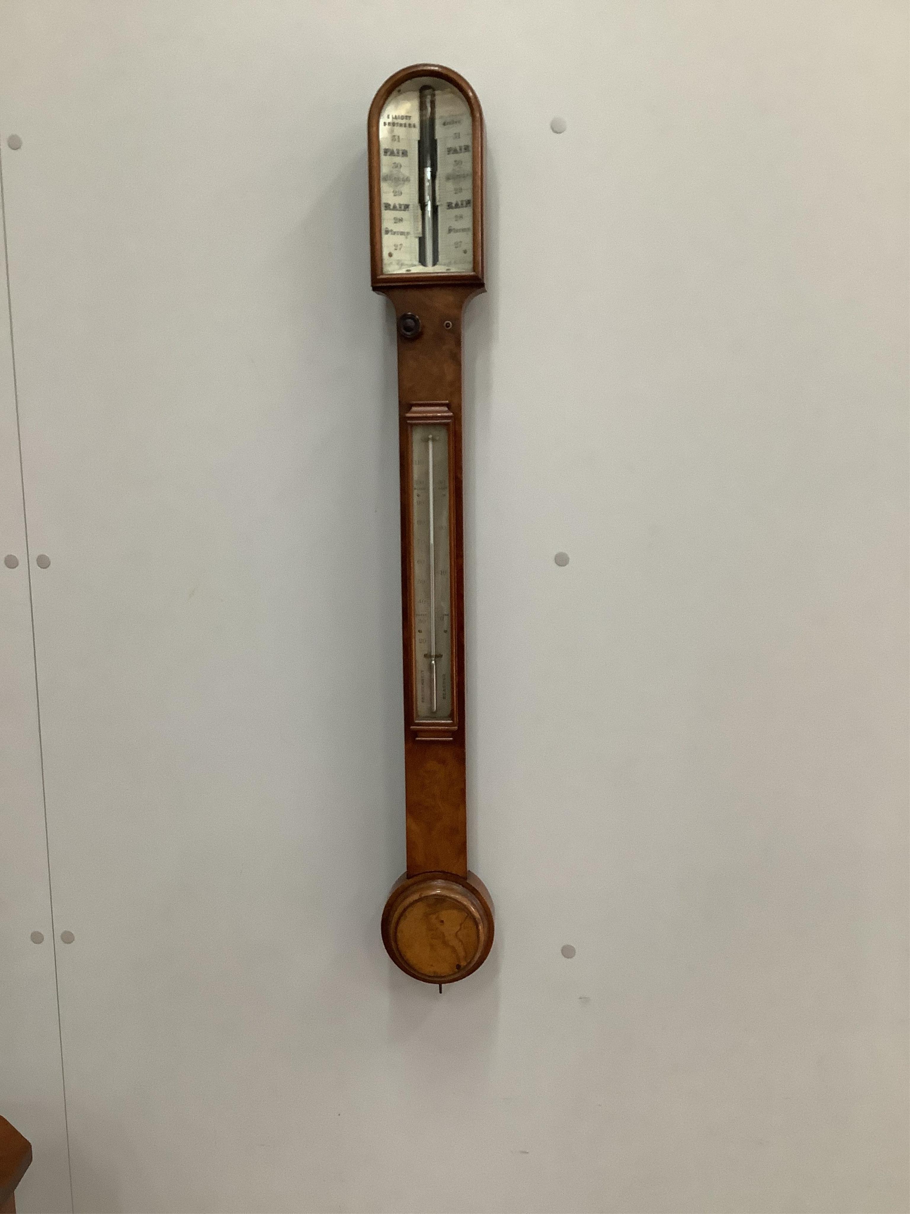 A Victorian burr walnut stick barometer, height 91cm. Condition - fair                                                                                                                                                      