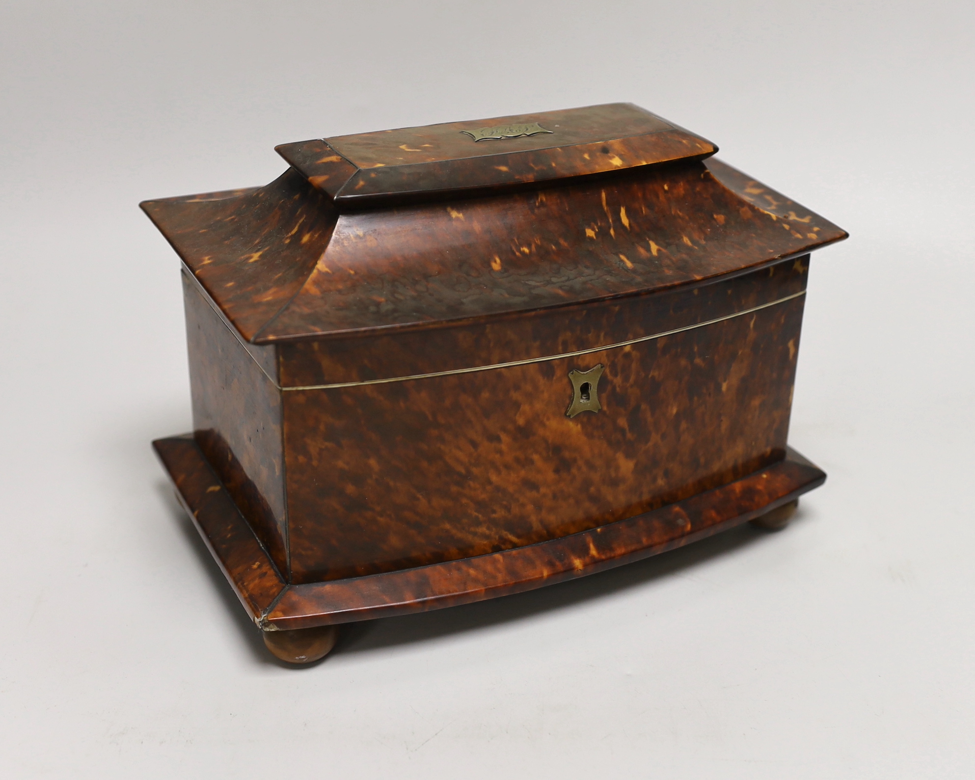 A late 19th century tortoiseshell tea caddy, 22.5cm wide                                                                                                                                                                    