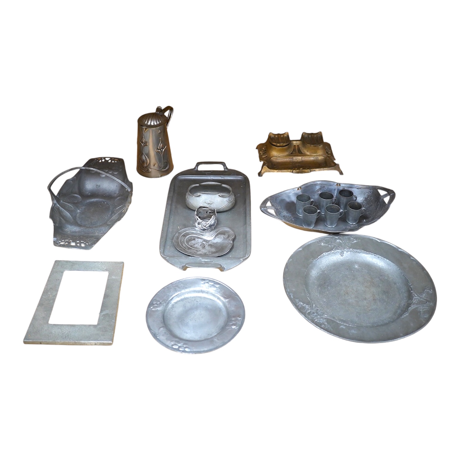 Art Nouveau English and Continental pewter, including a tray dish inkwell plate, etc., dish 30cm diameter (17). Condition - variable fair to good                                                                           