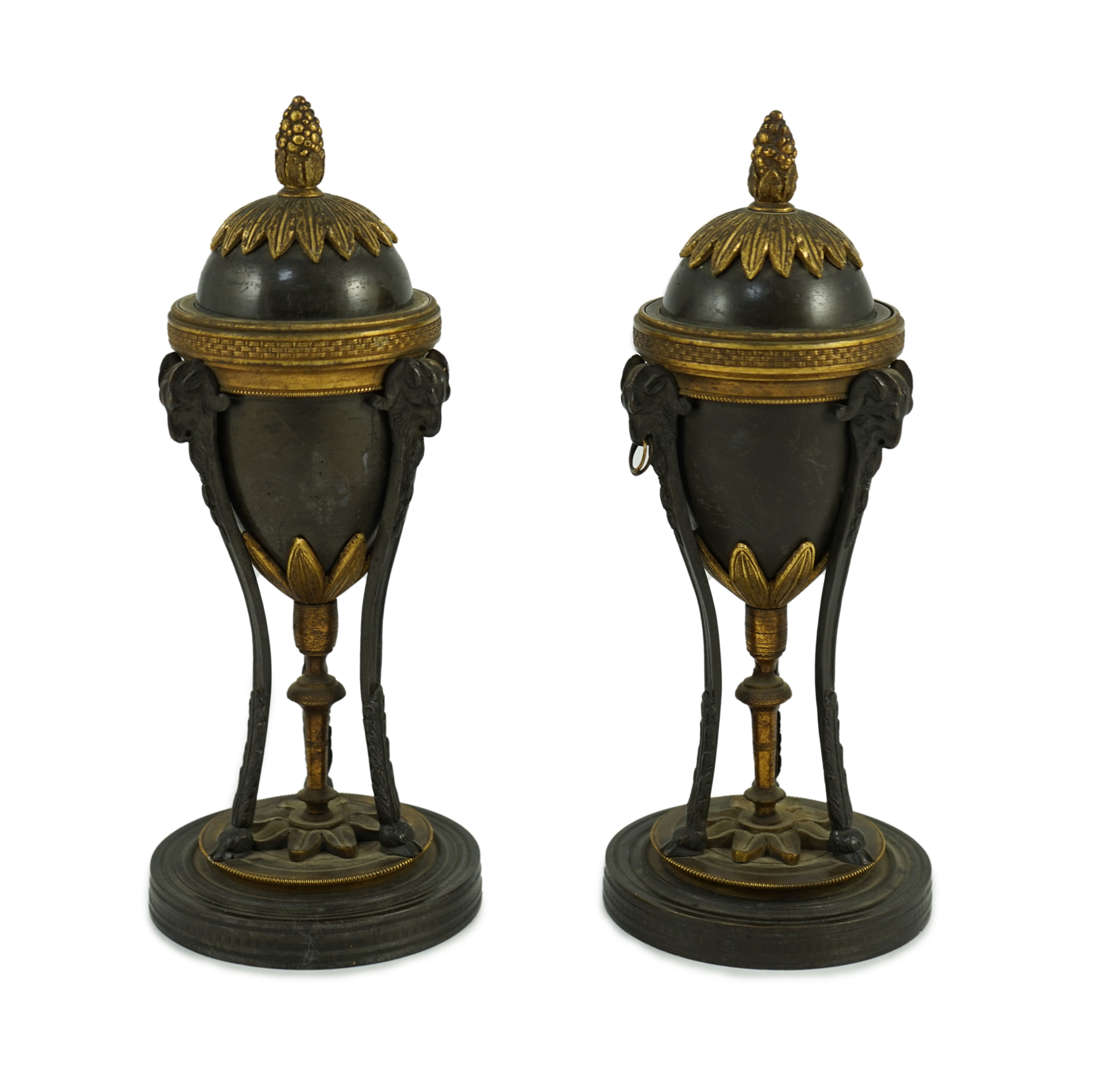 A pair of Louis XVI style bronze and ormolu cassolets Height 23cm.                                                                                                                                                          