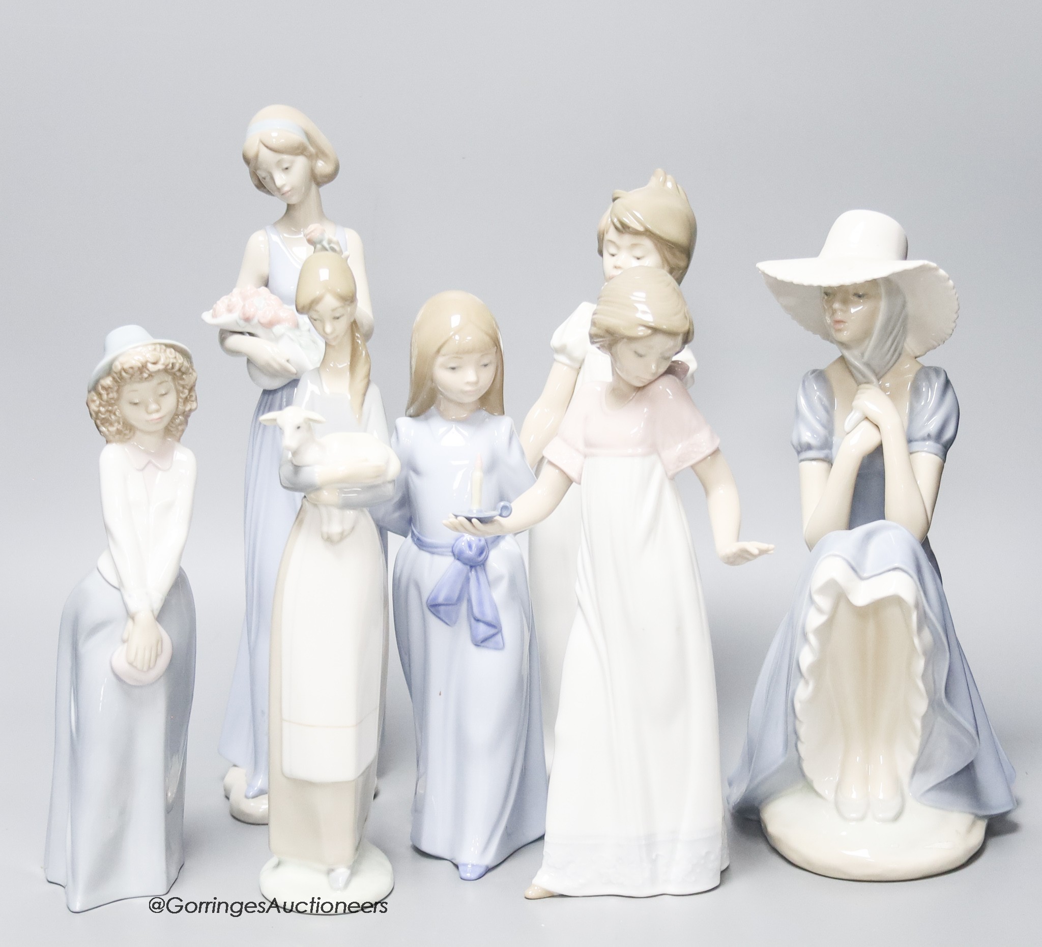 Six Nao porcelain figures and a Lladro figure (7)                                                                                                                                                                           