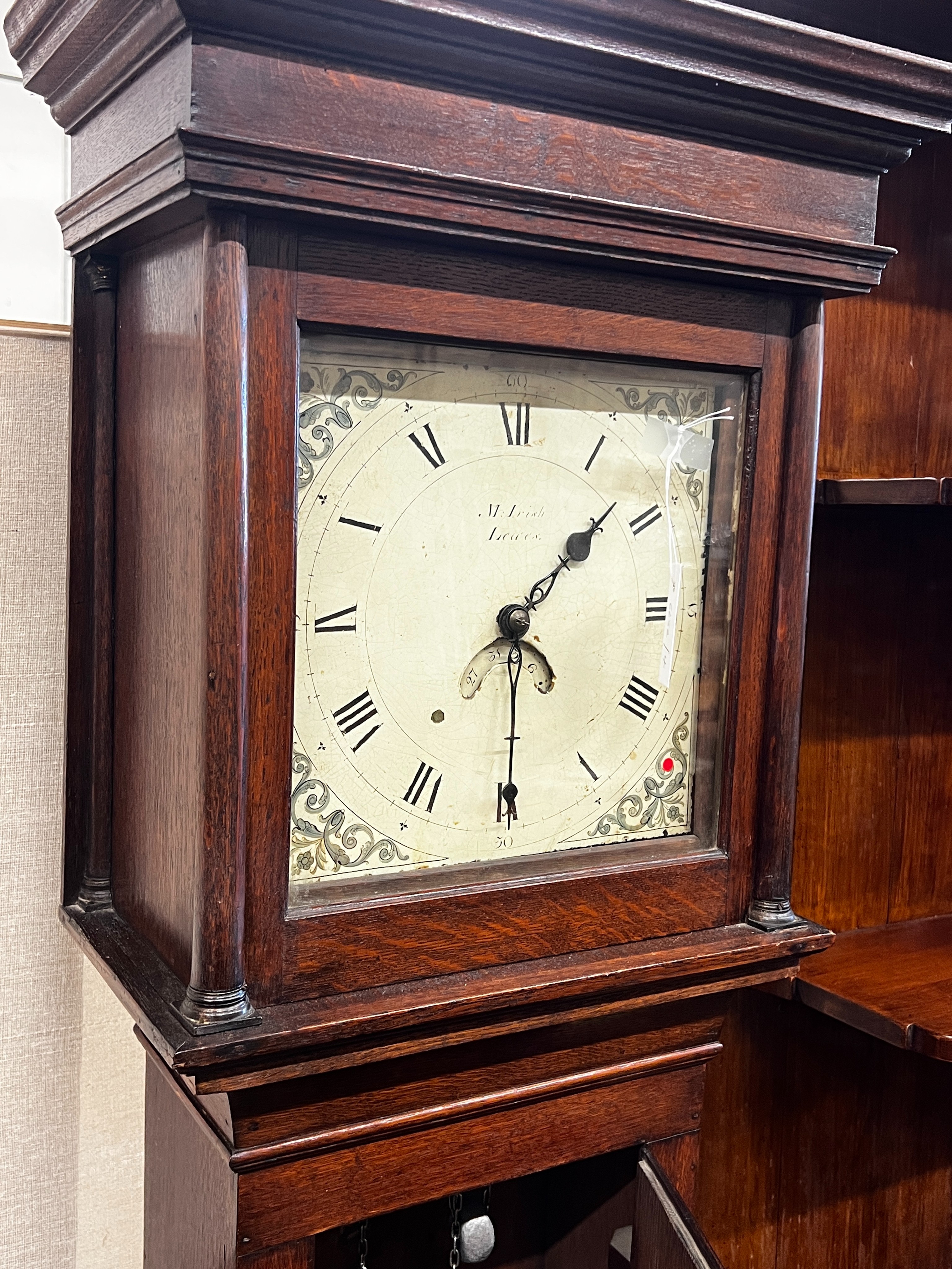 An early 19th century oak 30 hour longcase clock marked M. Irish, Lewes, height 196cm                                                                                                                                       