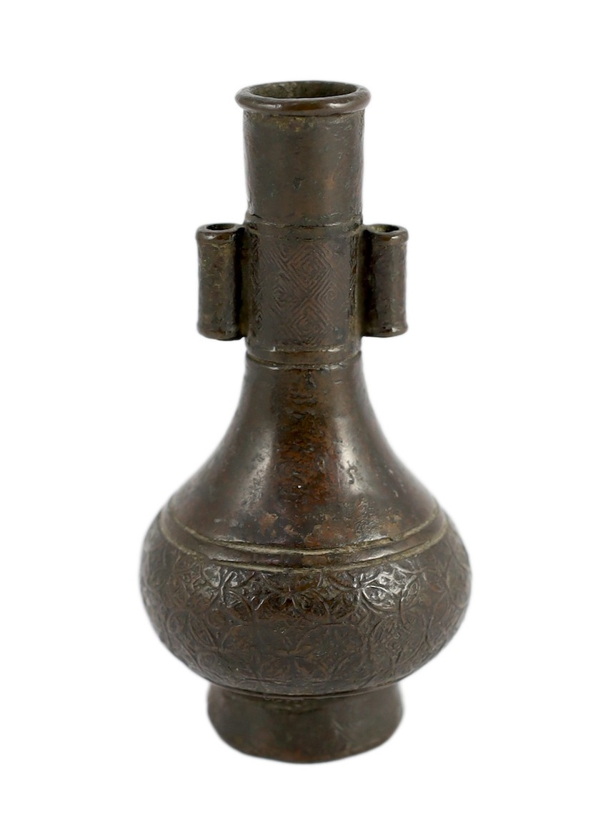A small Chinese archaistic bronze arrow vase, Yuan/Ming dynasty, 11.8cm high, base panel lacking                                                                                                                            