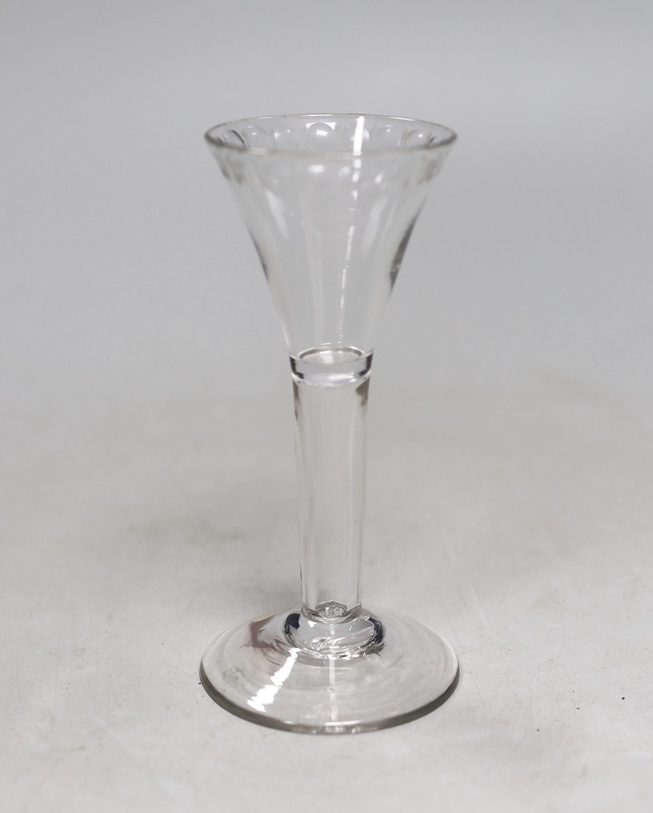 A Georgian hollow stem excise glass. 13cm tall                                                                                                                                                                              