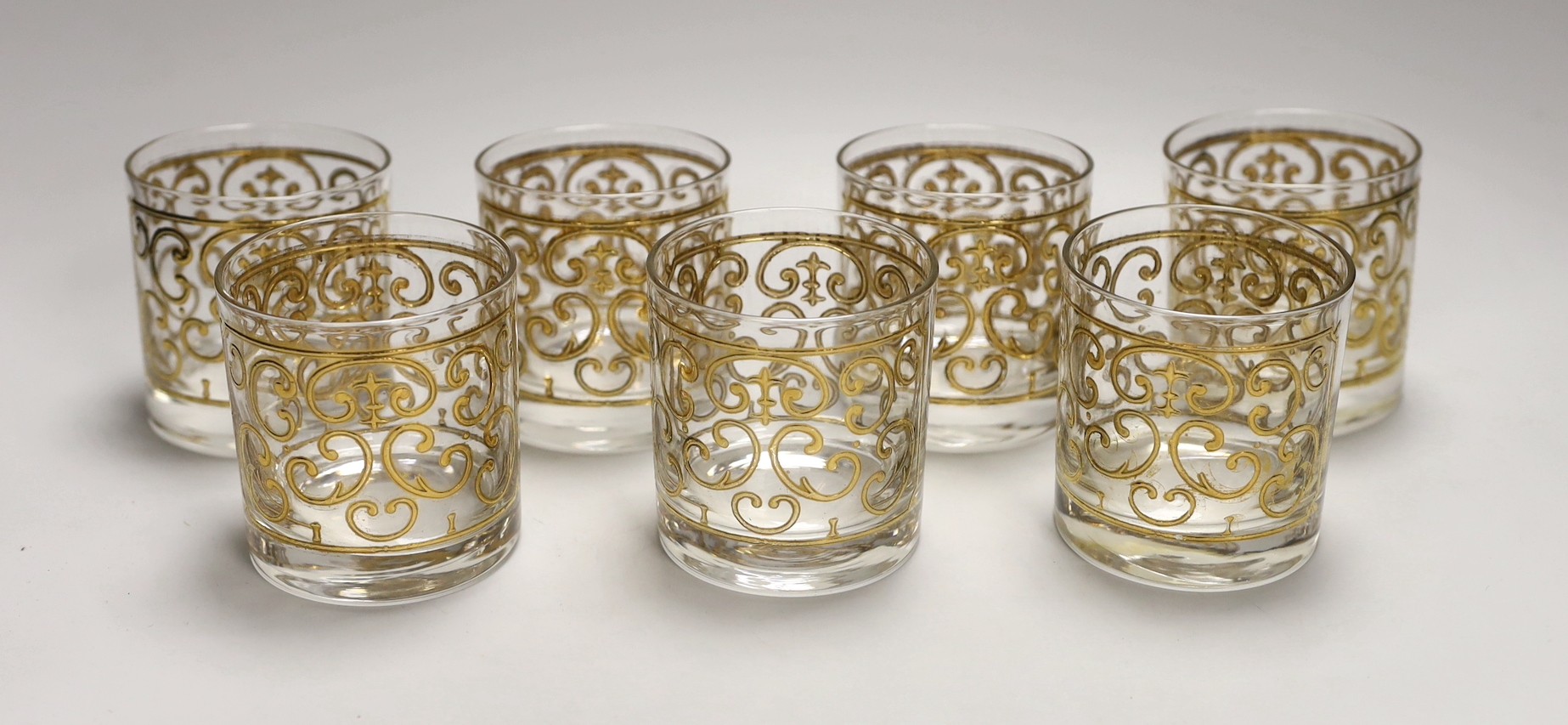 A set of seven Georges Briard gilded glass tumblers                                                                                                                                                                         