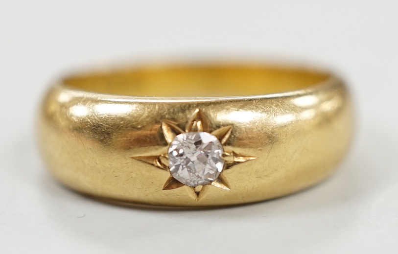 A late Victorian 18ct gold and gypsy set solitaire diamond ring, size J, gross weight 2.8 grams.                                                                                                                            