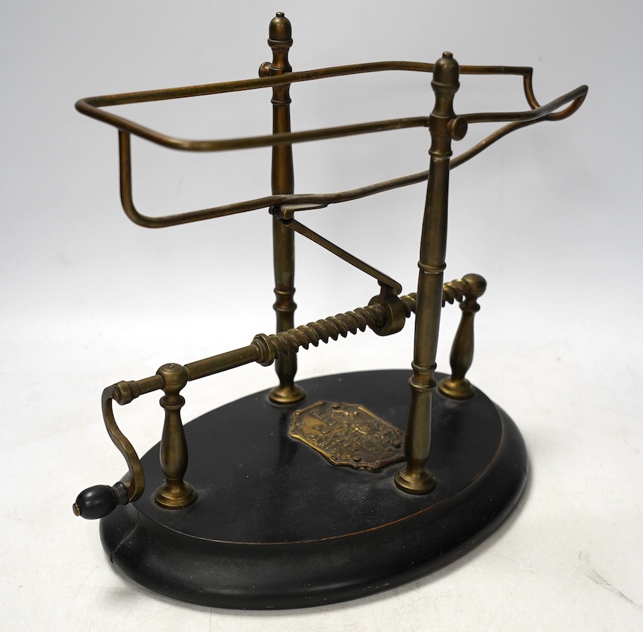 A Victorian Farrow & Jackson of London and Paris wine cradle or decanting machine, 32cm. Condition - fair to good                                                                                                           