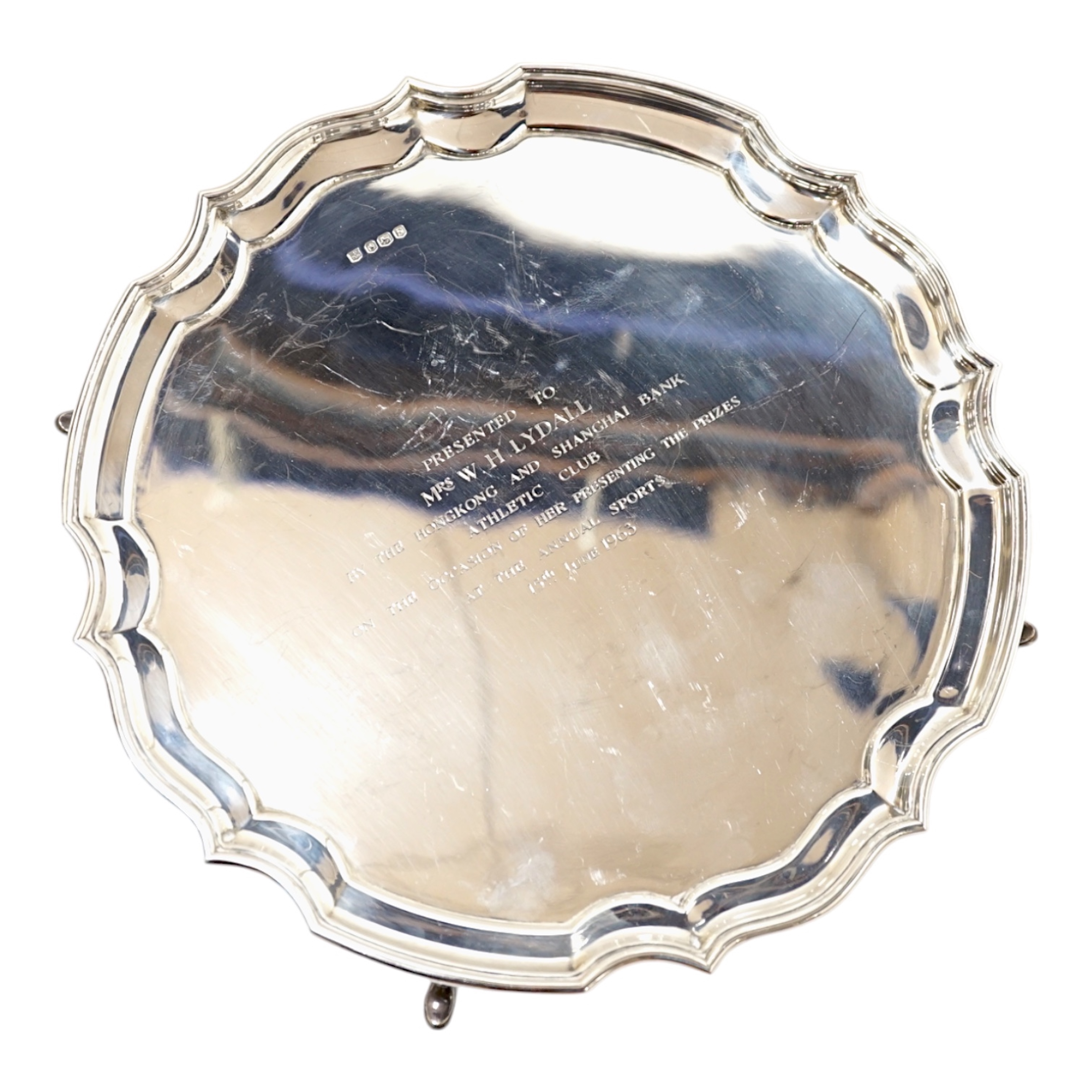 An Elizabeth II silver salver, with engraved inscription, Poston Products Ltd, Sheffield, 1960, 30.2cm, 25.9oz. Condition - fair                                                                                            