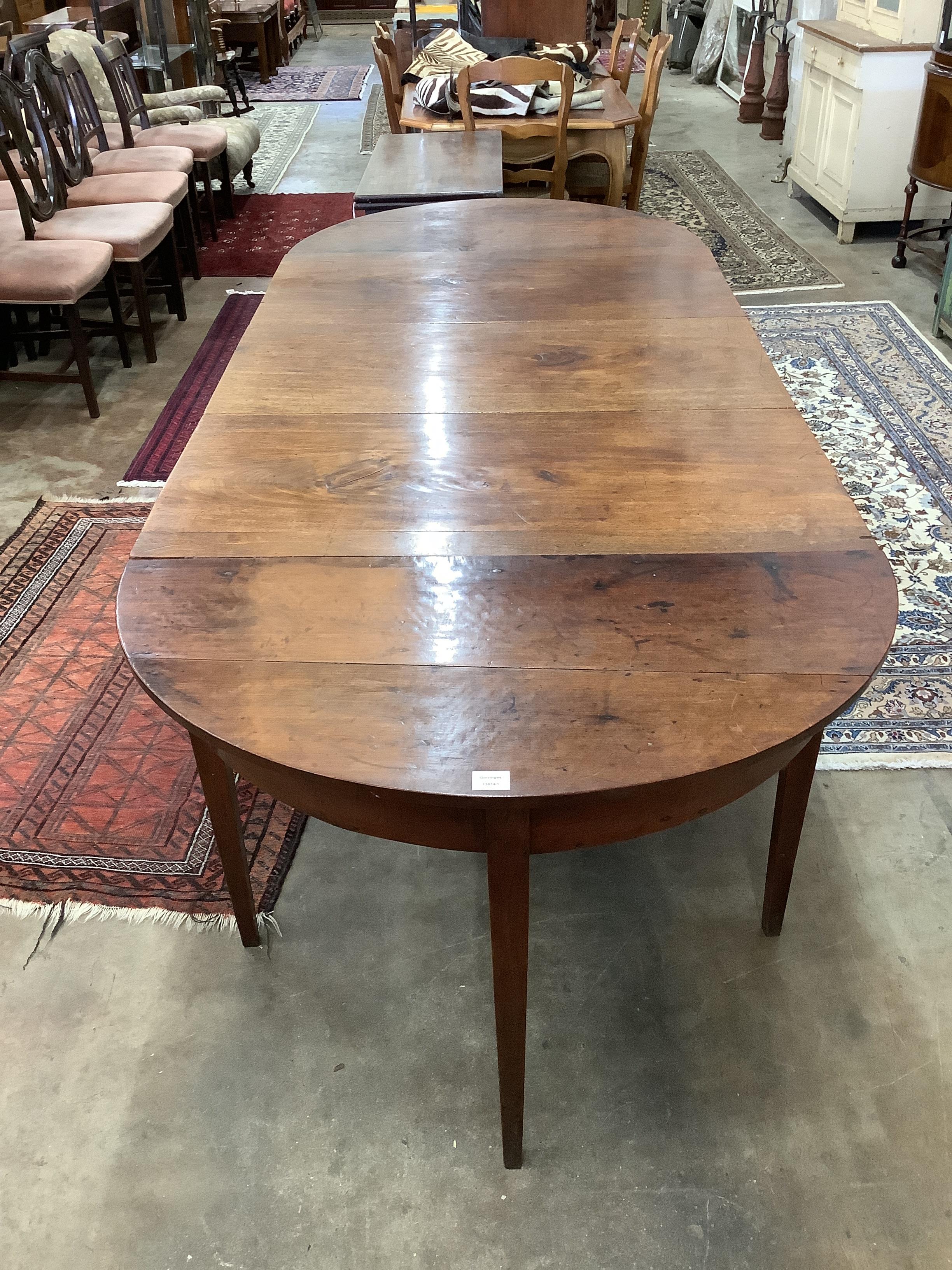 A George III mahogany D end extending dining table, width 260cm, depth 107cm, height 73cm                                                                                                                                   