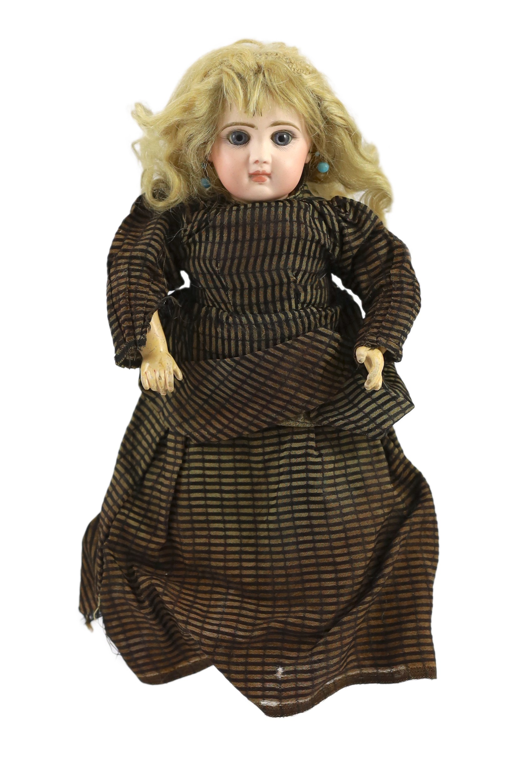 A Tete Jumeau bisque doll, French, circa 1885, 14in.                                                                                                                                                                        