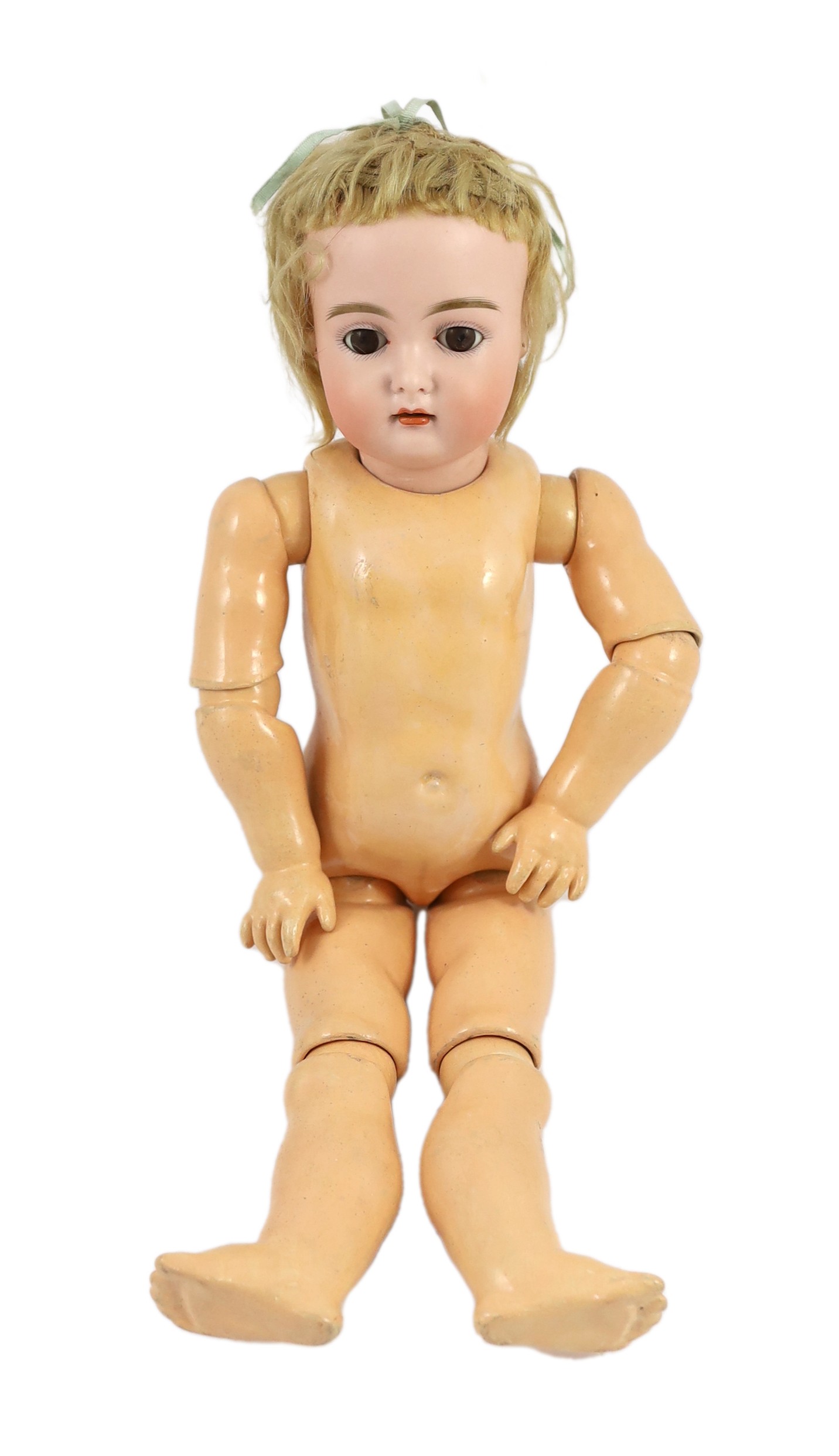 A J.D. Kestner bisque doll, German, circa 1910, 18in.                                                                                                                                                                       