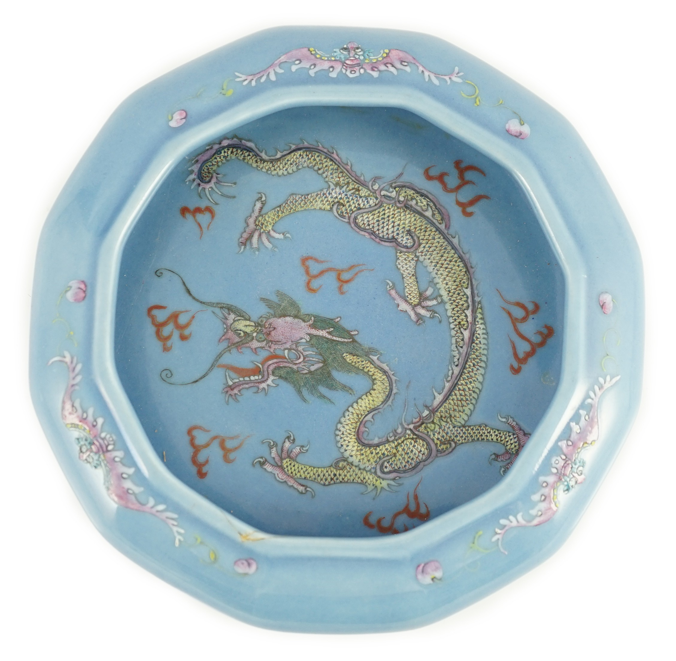 A Chinese blue ground ‘dragon’ dodecagonal brushwasher, late 19th/early 20th century, 22.5cm wide, cracks to rim                                                                                                            
