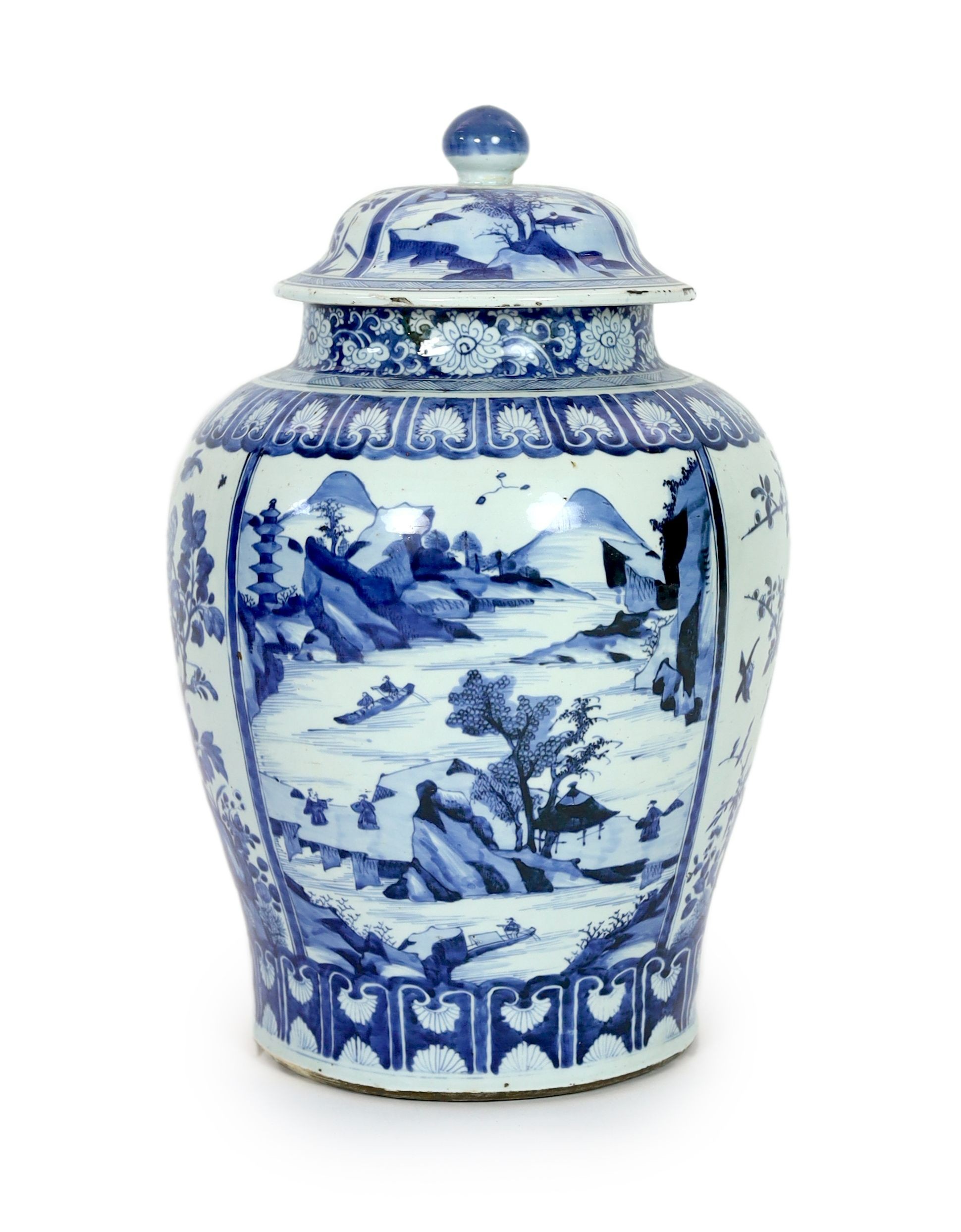 A large Chinese blue and white jar and cover, Kangxi period, 58cm high, Some restored cracks                                                                                                                                