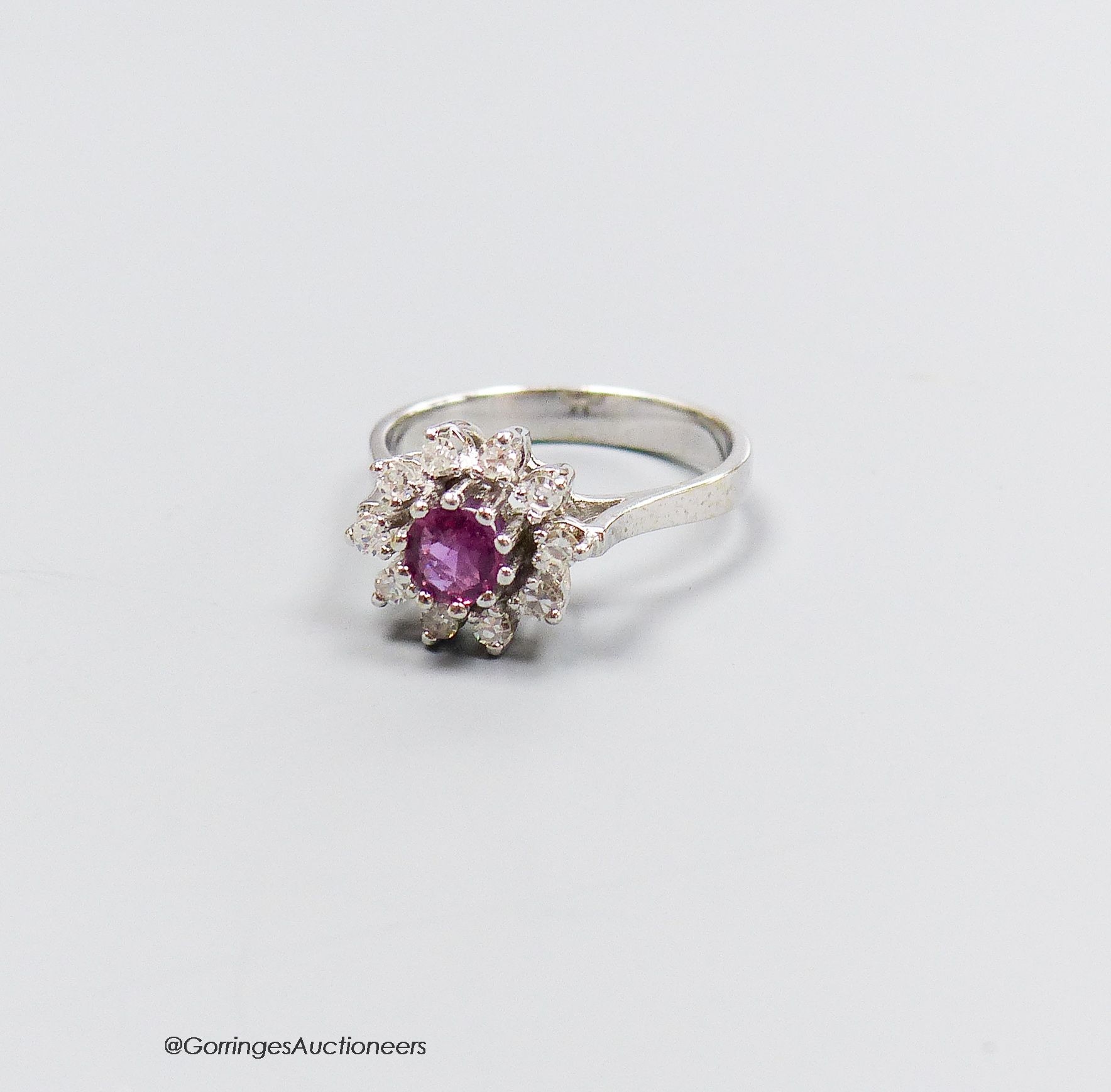 A 14k white gold pink sapphire and diamond cluster ring, size L, gross 3g 150-200                                                                                                                                           