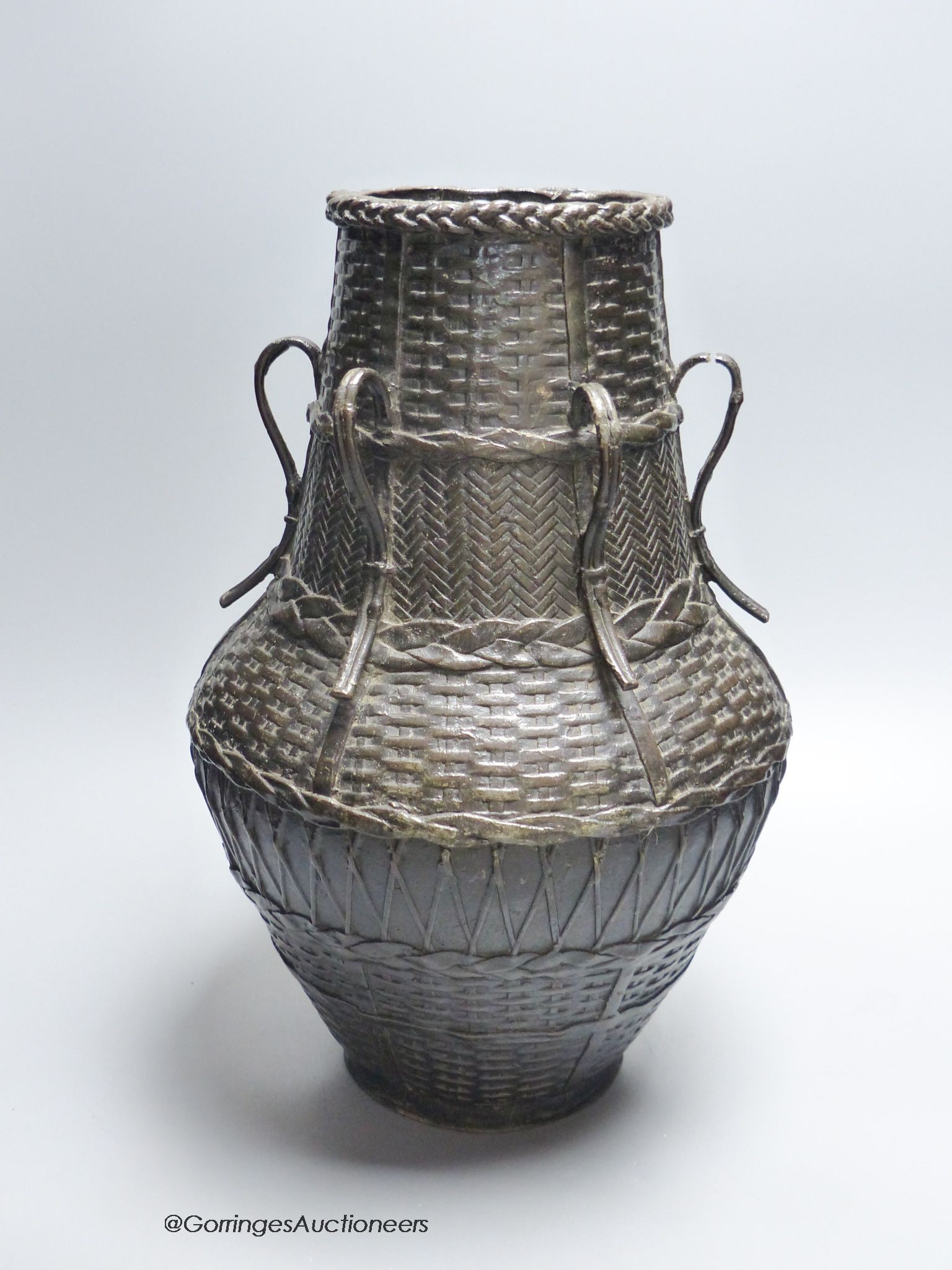 A large Japanese bronze basket effect ikebana vase, Meiji period                                                                                                                                                            