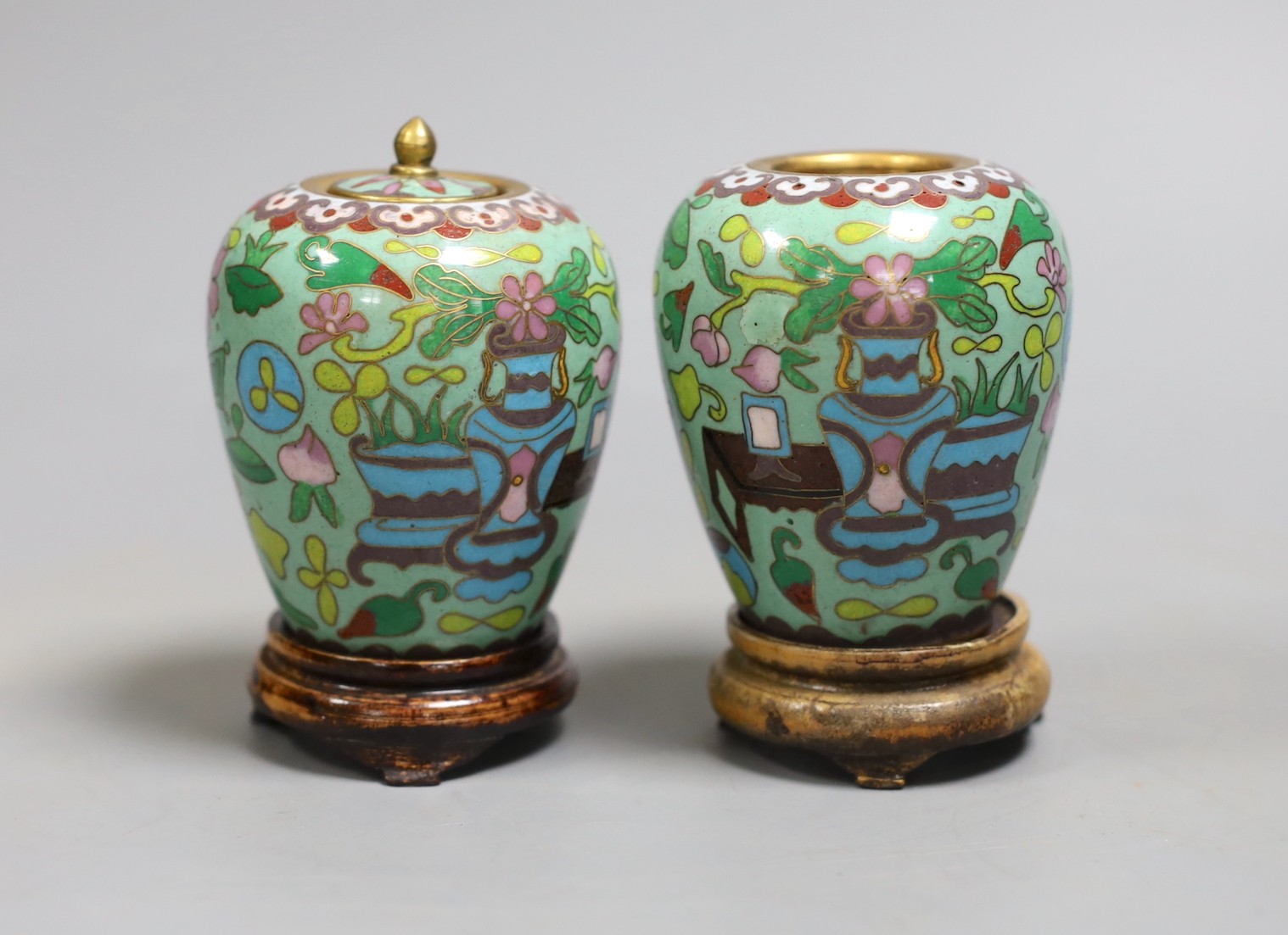 A pair of Chinese cloisonné enamel jars, wood stands, 9cm                                                                                                                                                                   