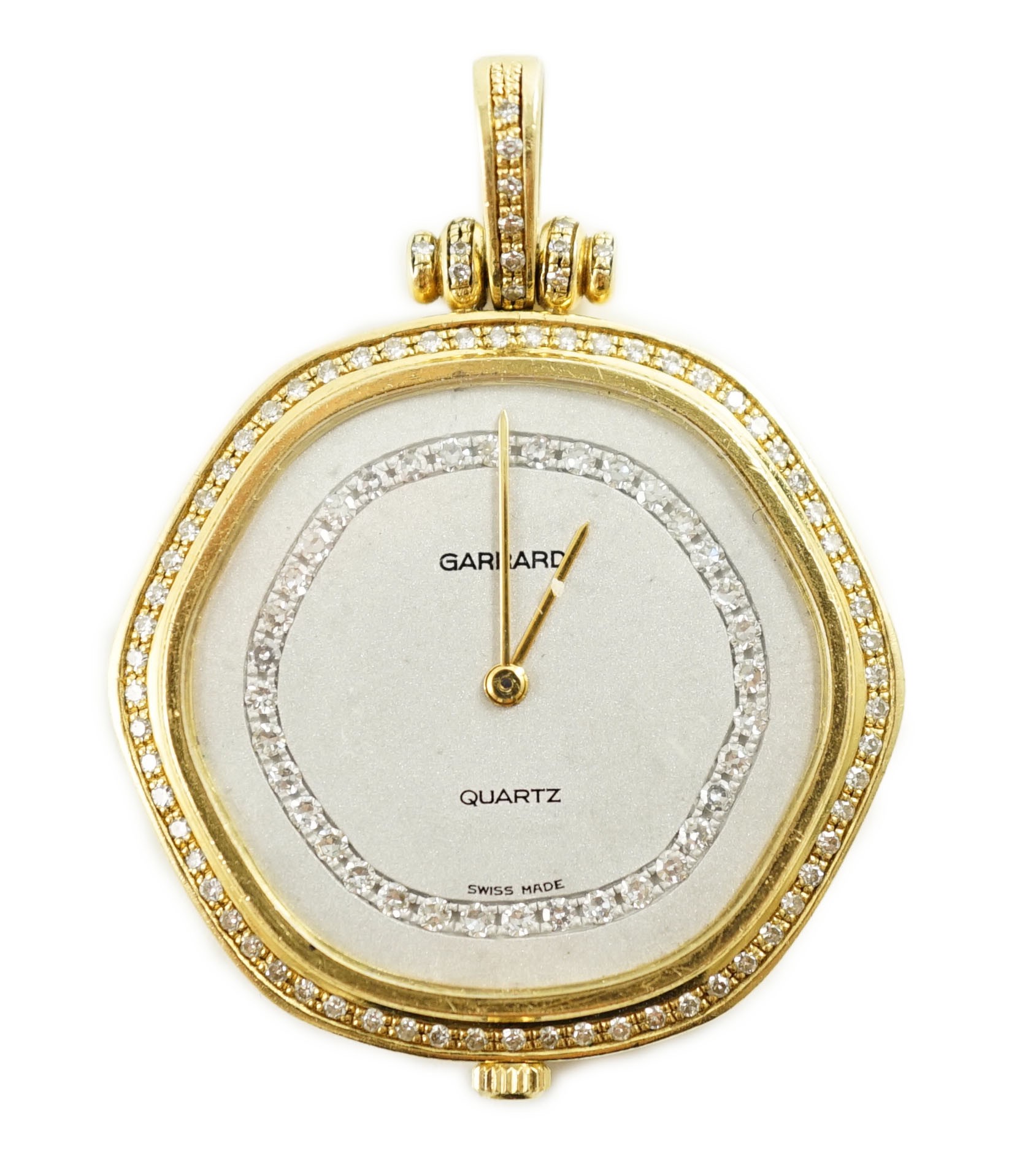 A modern 18ct gold and diamond set quartz shaped hexagonal pendant dress watch, retailed by Garrard                                                                                                                         