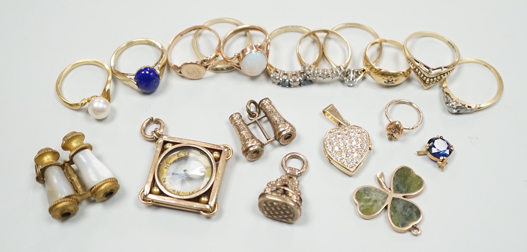 A small collection of Edwardian and later jewellery, including an 18ct gold and diamond chip set ring, size G, an 18ct and small solitaire diamond ring, size N/O and an 18k and single stone ring by Mikimoto, size L, 18ct