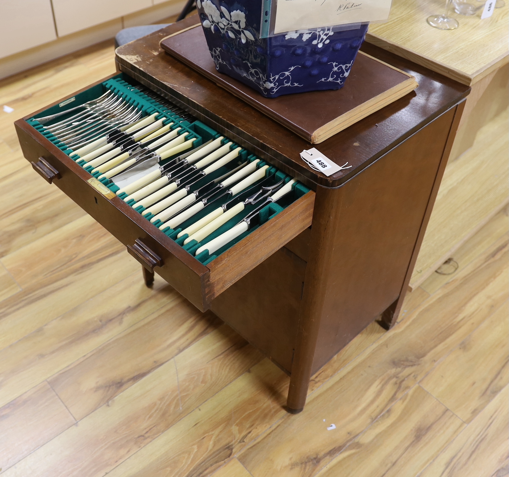 A two drawer canteen of Walker & Hall silver plated cutlery, almost complete, 62cm wide, 77cm high                                                                                                                          