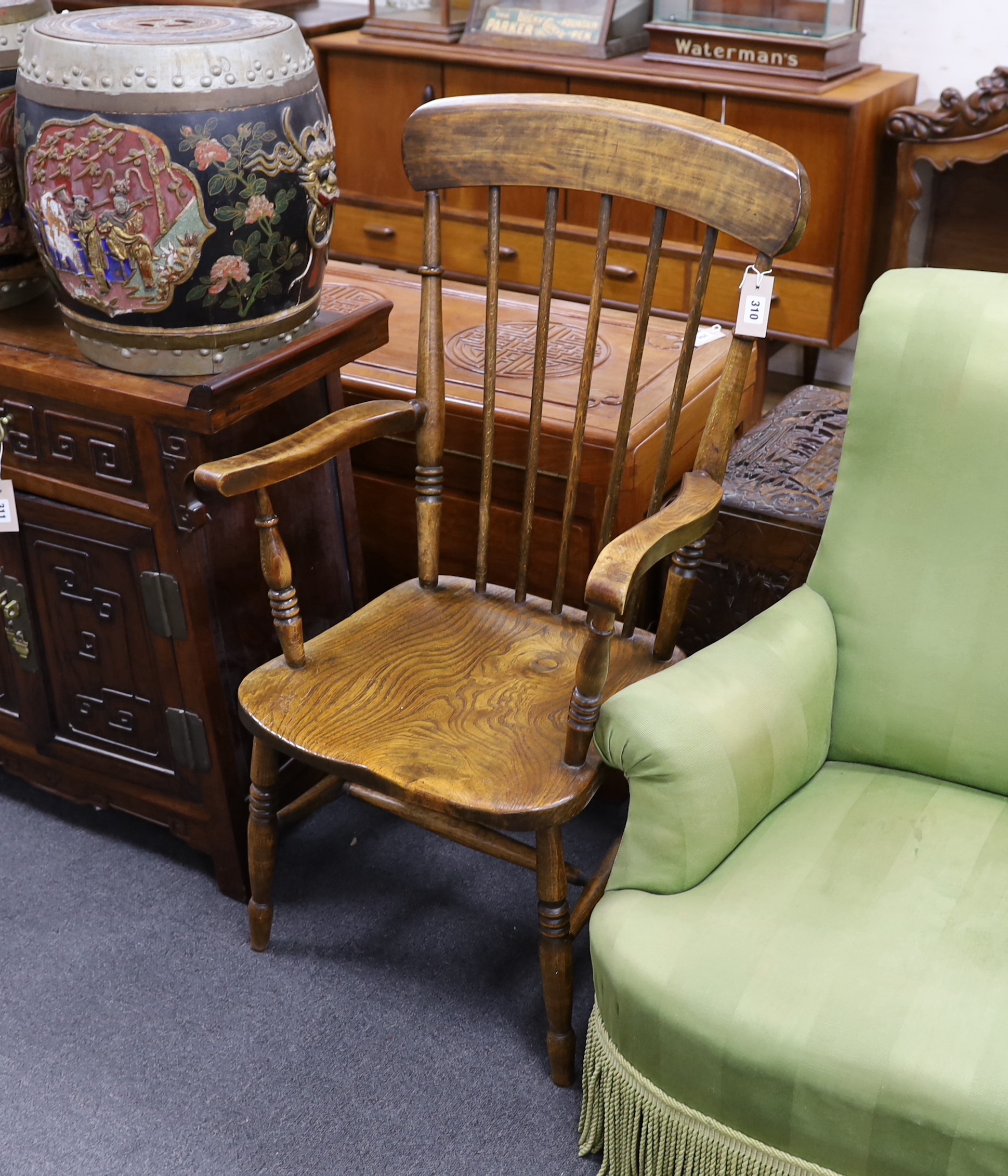A Victorian elm and beech Windsor comb back armchair, width 55cm, depth 46cm, height 108cm                                                                                                                                  