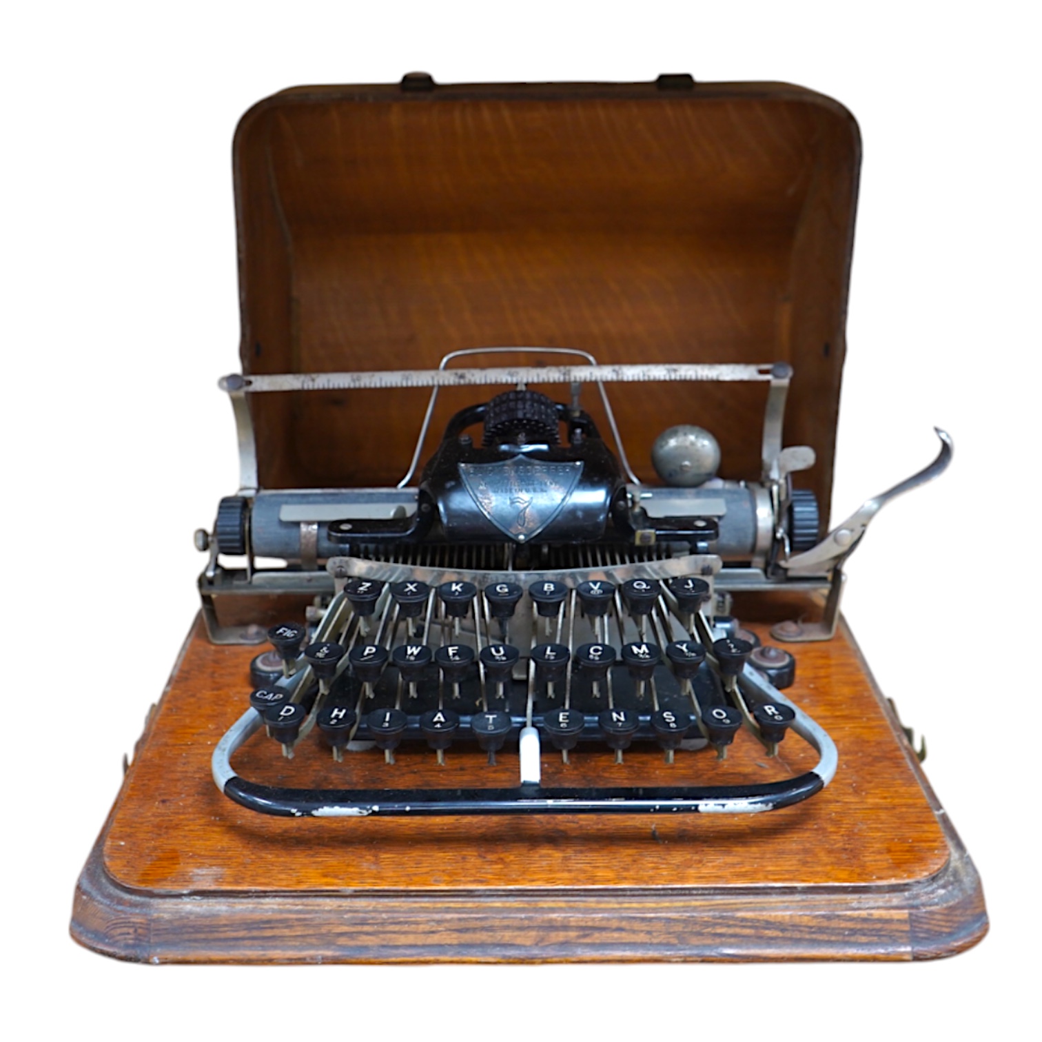 A late 19th century Blickensderfer Newcastle-on-Tyne, manual typewriter, model No.7, in an oak case with oak plywood cover, Made in the USA. Condition - fair to good, the action appears to move smoothly. There are some r