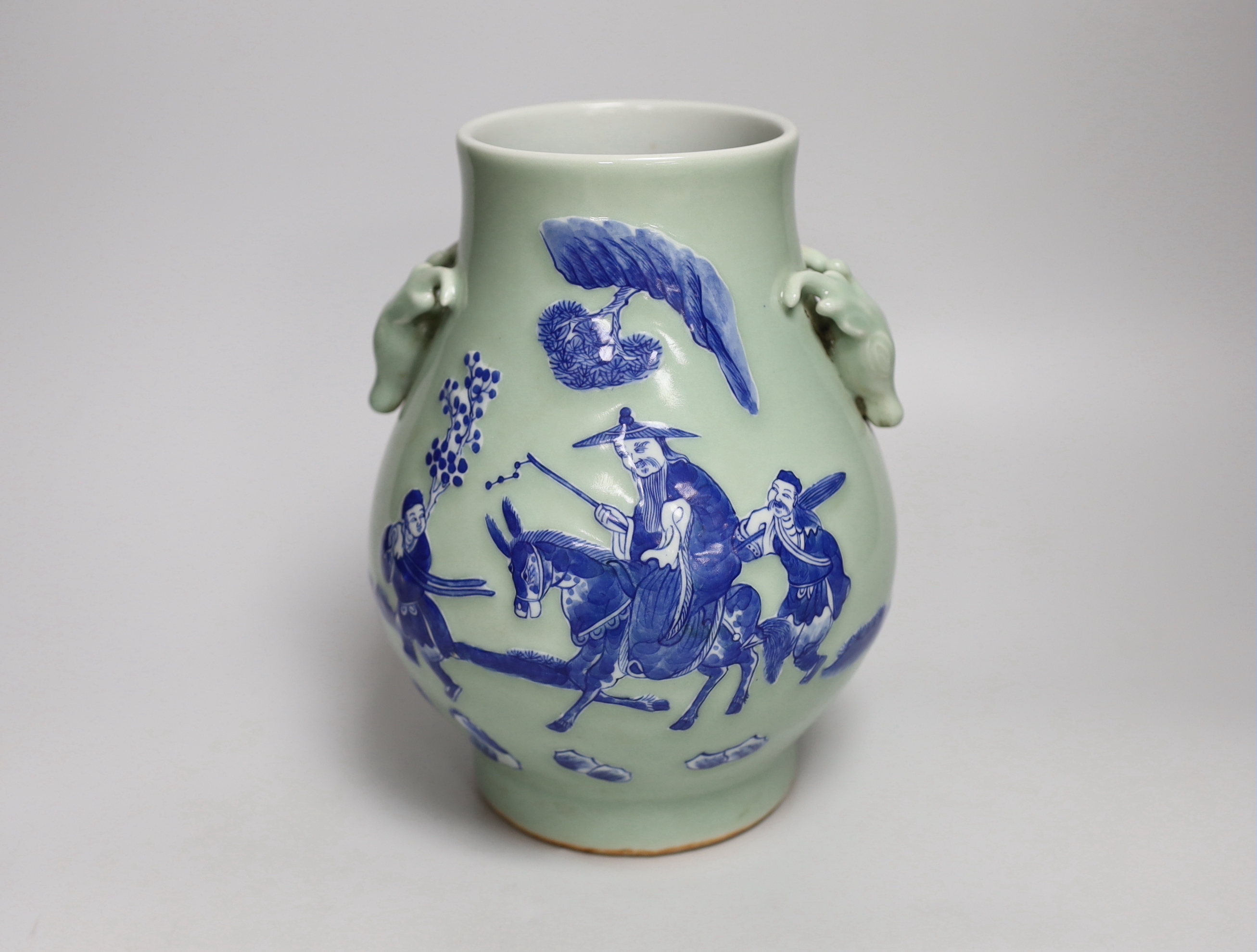 A Chinese underglaze blue and slip decorated celadon ground celadon vase, hu, 23cm high                                                                                                                                     